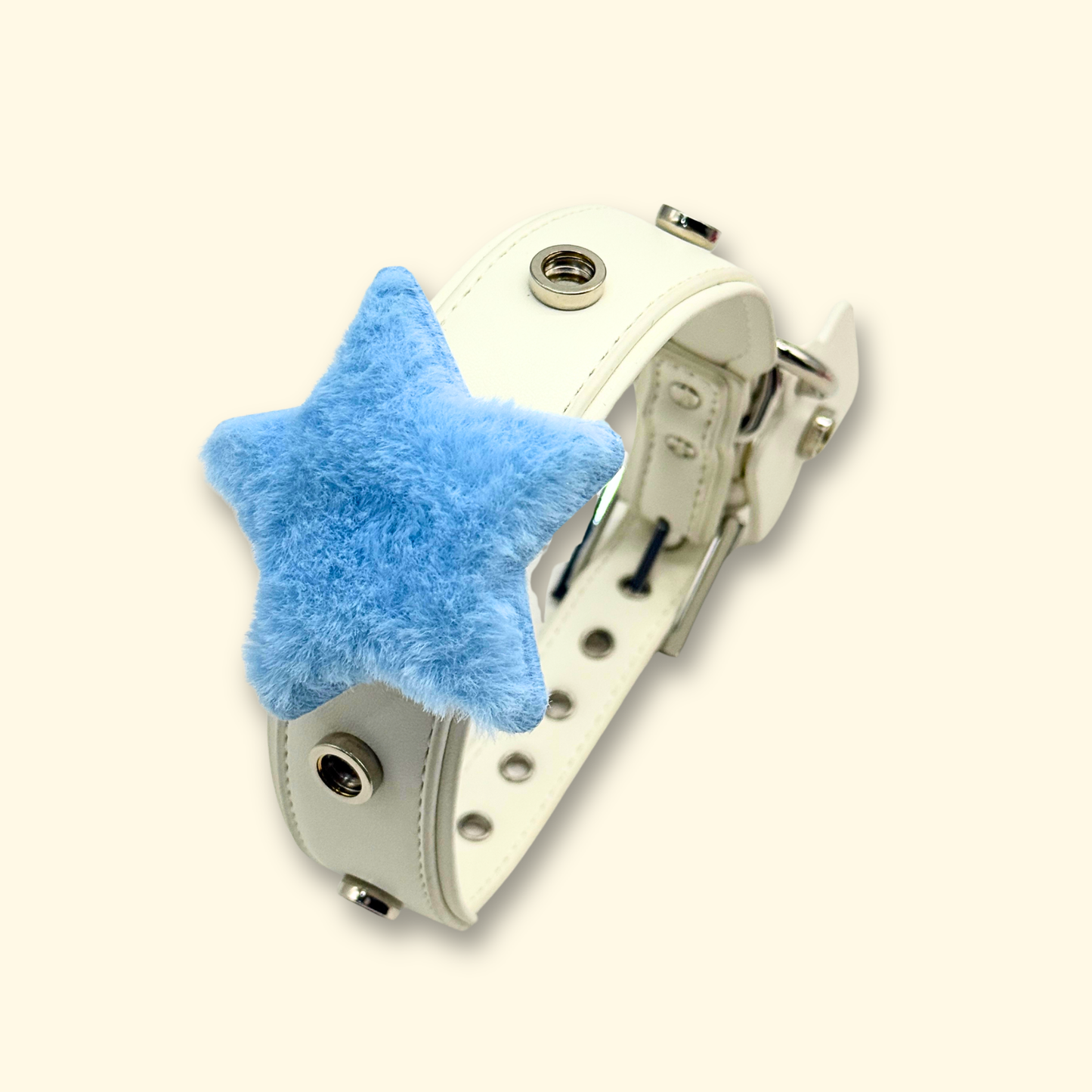 Blue star plush charm on a white pet collar
