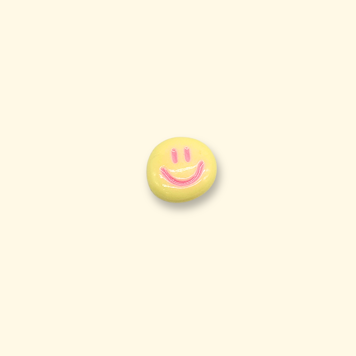 Yellow smiley face pet charm, a cheerful and colorful accessory for pet collars