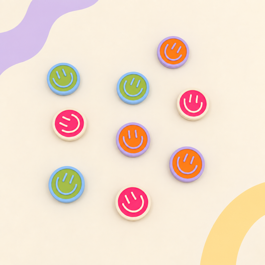 Colorful smiley face dog collar charms in pink, green, orange and black designs