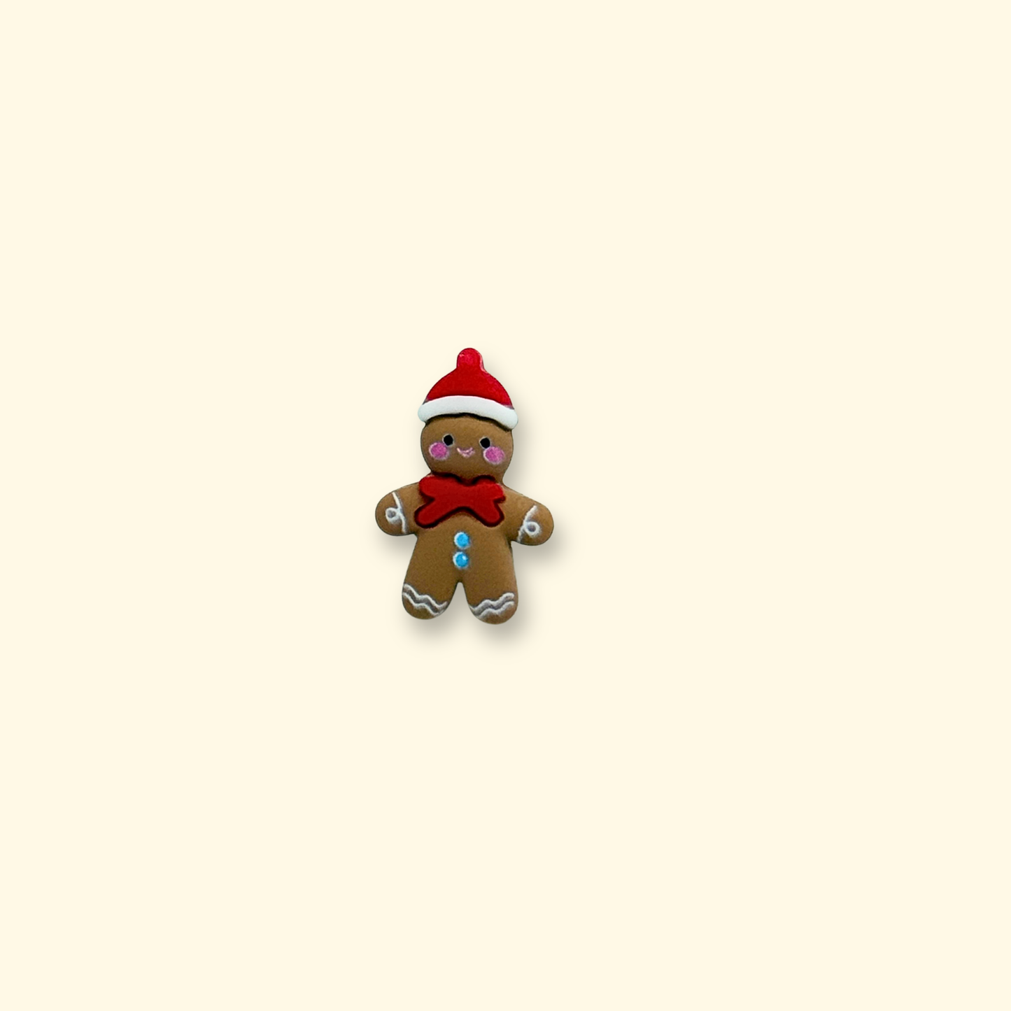Gingerbread man pet collar accessory with a red scarf and Santa hat