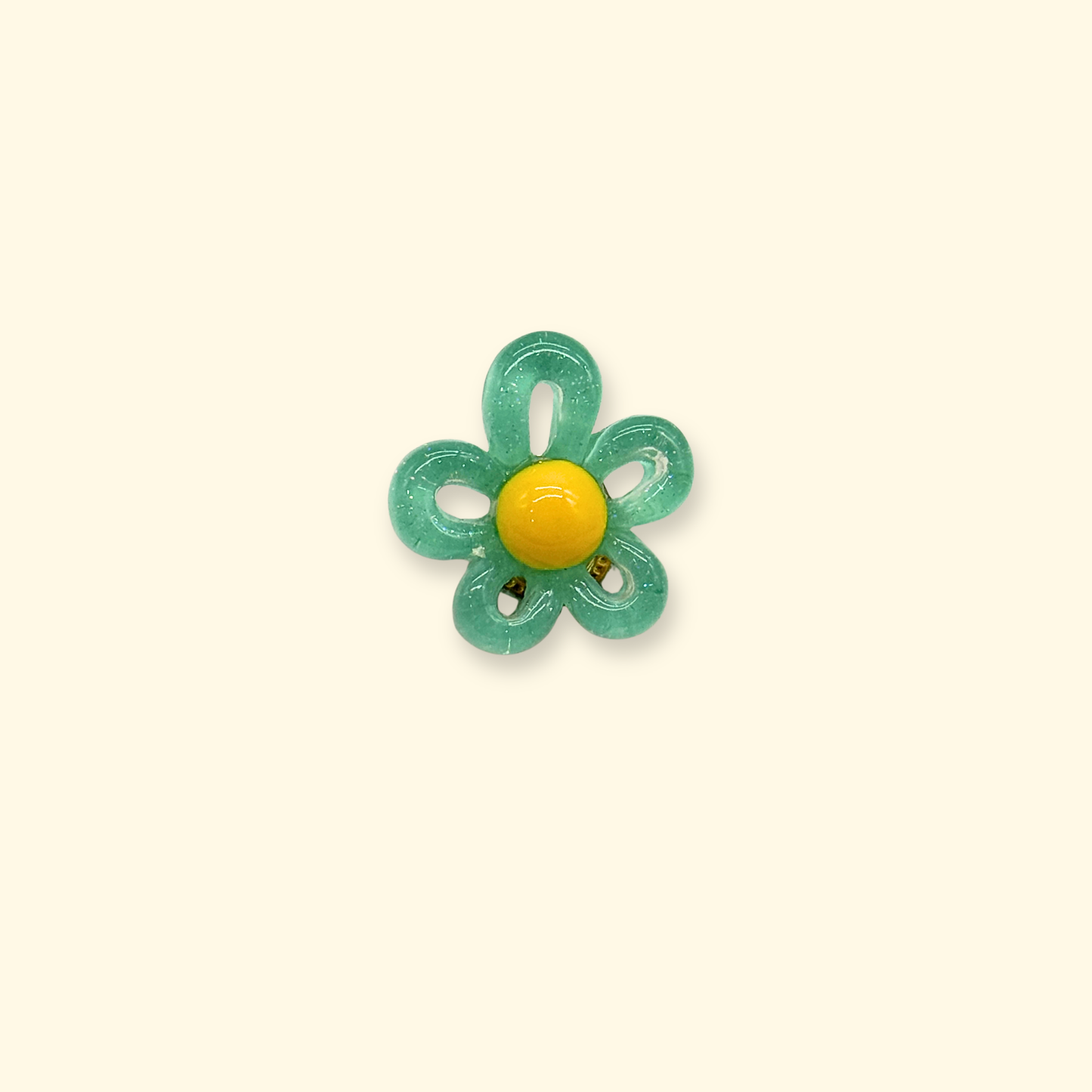 Green translucent flower dog collar charm with yellow center, interchangeable snap-on pet accessory for customizable collars