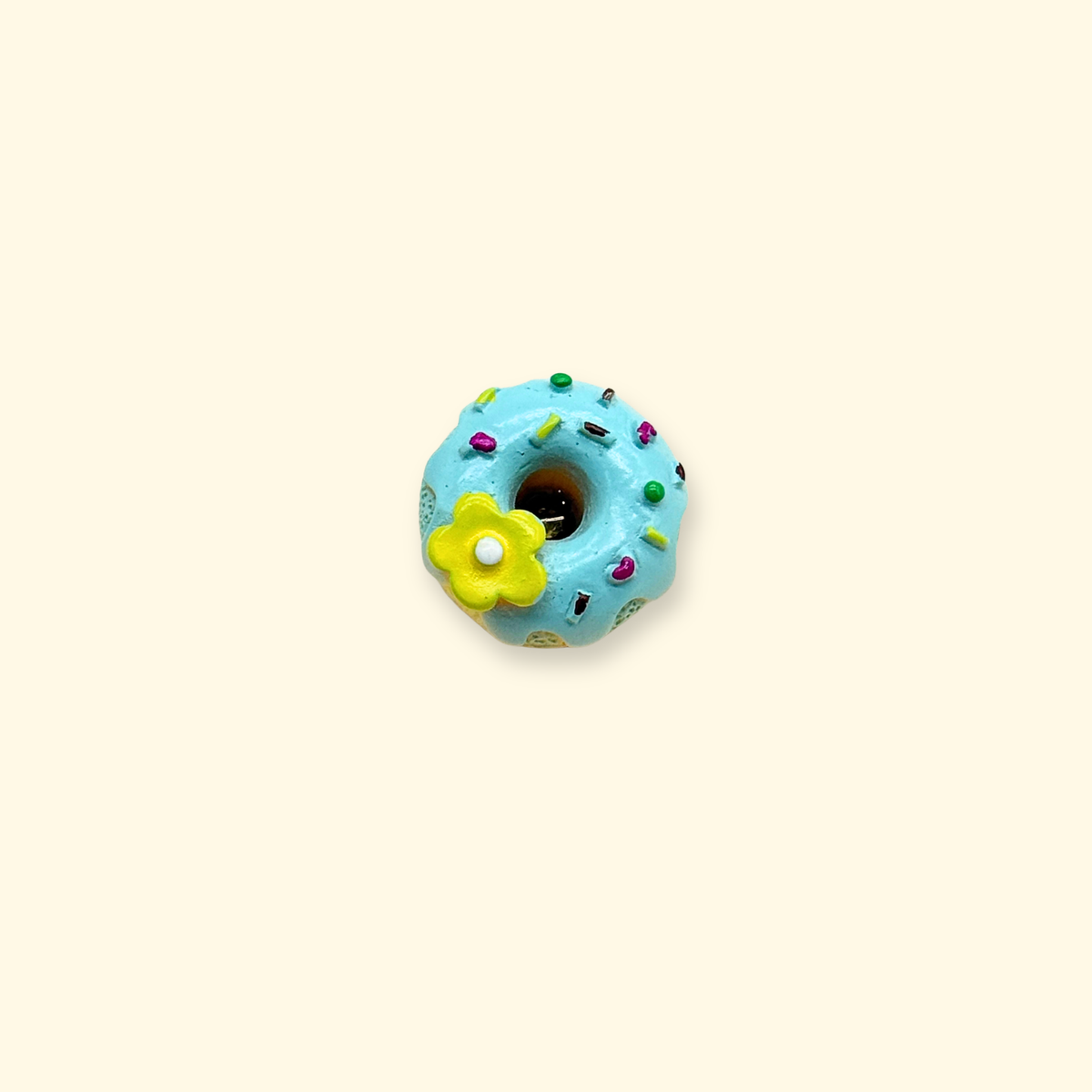 Blue donut dog collar charm with colorful sprinkles and yellow flower detail