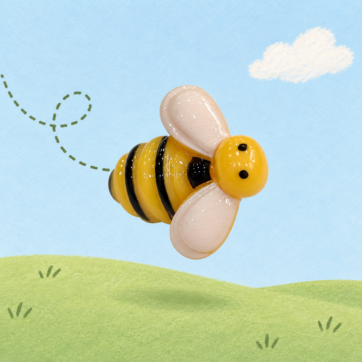 Bumblebee dog collar charm with a yellow and black striped body and translucent wings