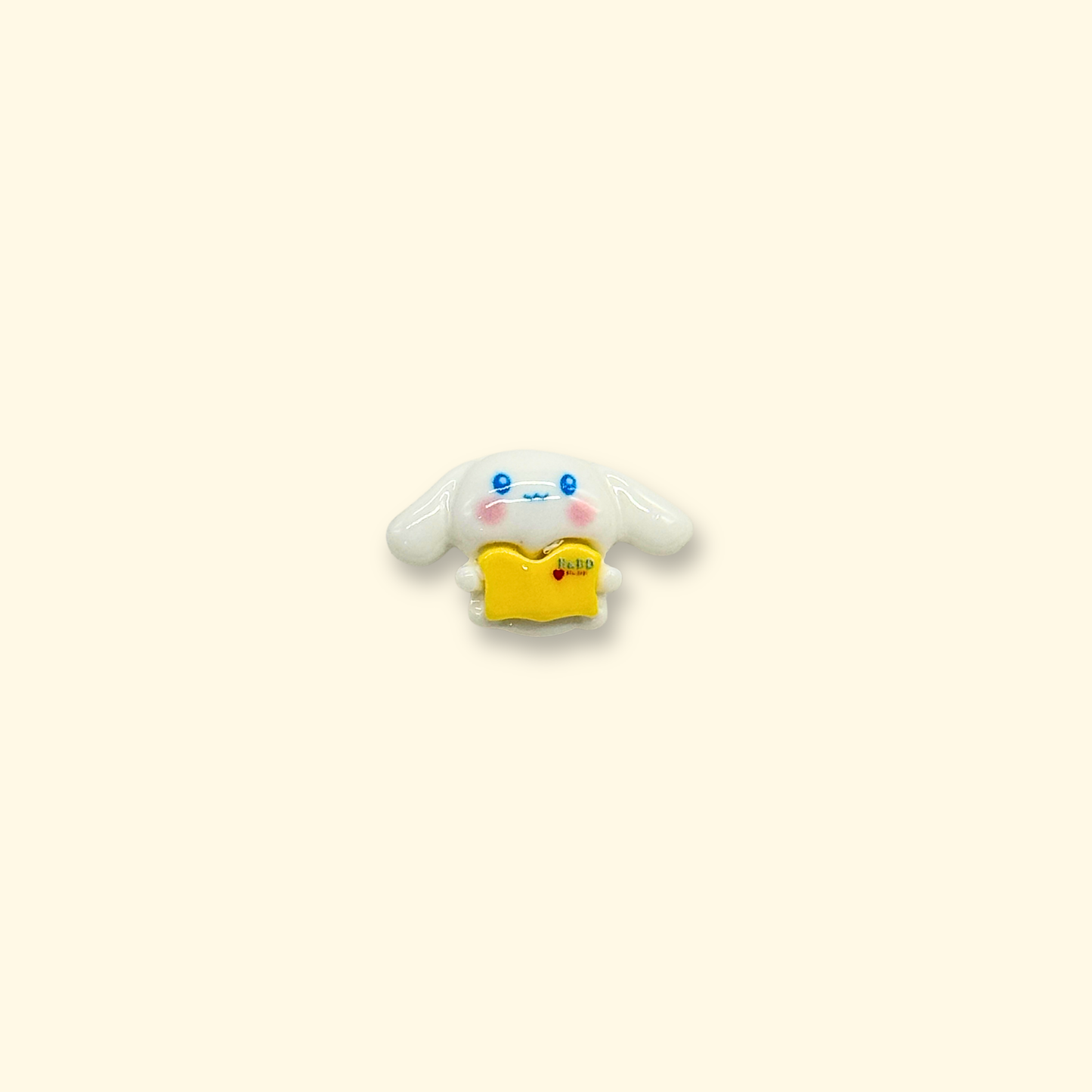 Adorable bunny with a yellow star-shaped charm for pet accessories