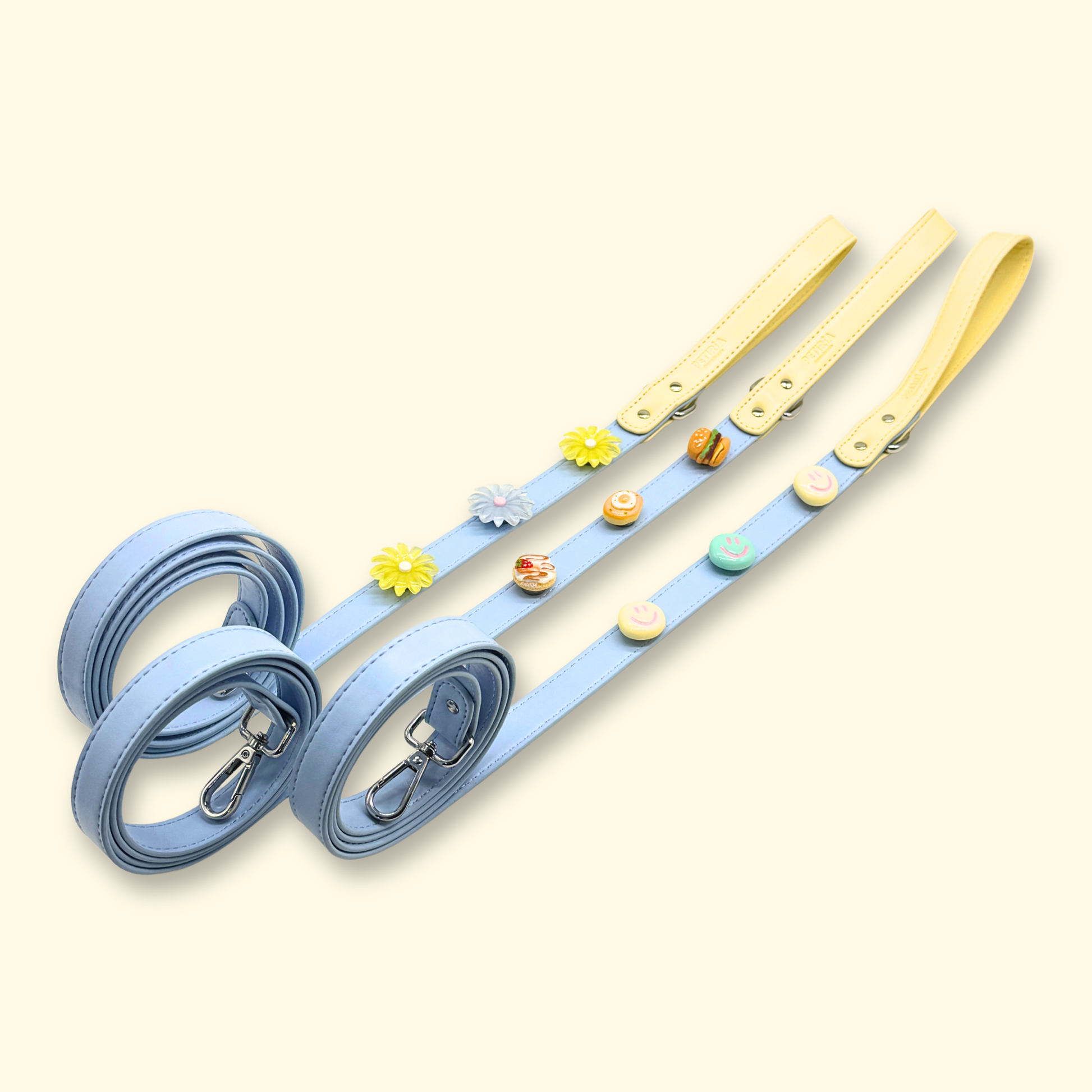 Butter yellow and sky blue dog leashes with interchangeable charms for stylish dogs and cats