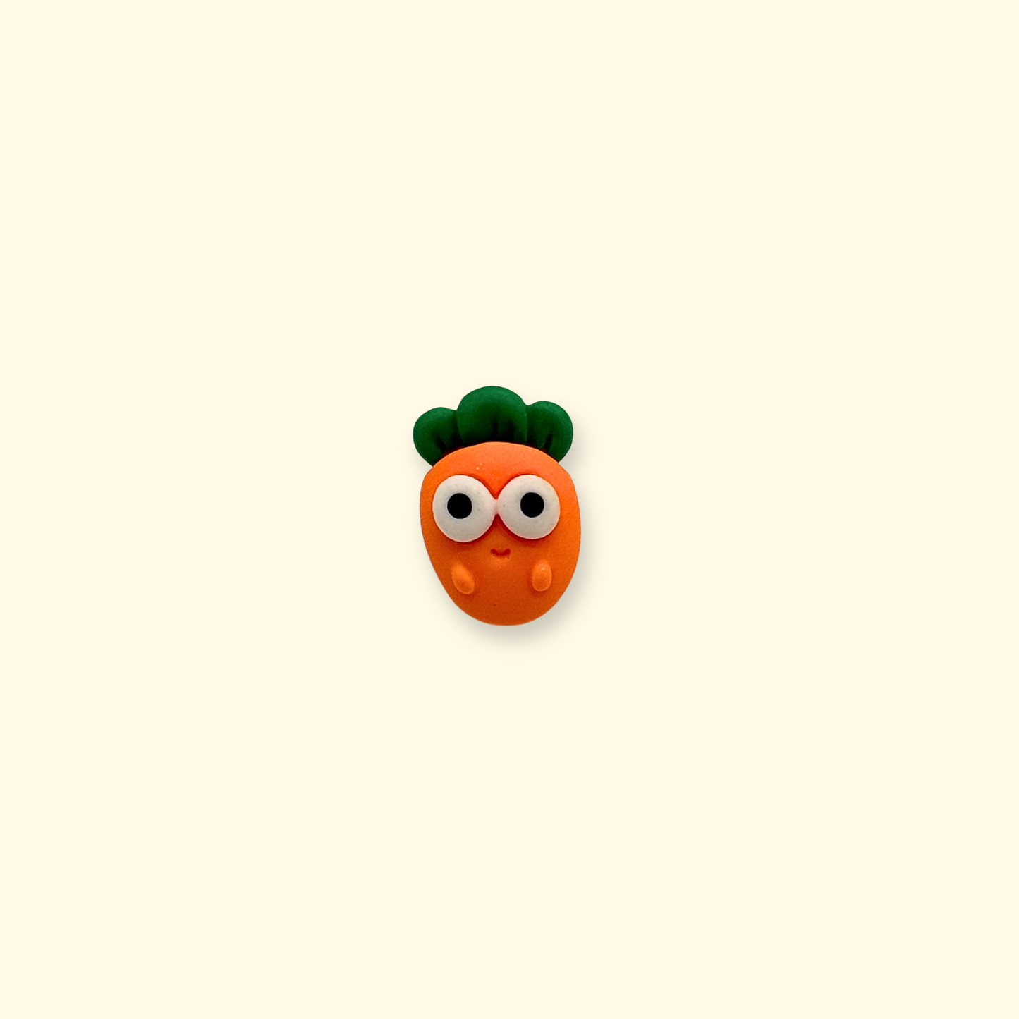 Orange carrot emoji dog collar charm with green leaves, designed as a snap-on accessory for customizable pet collars.