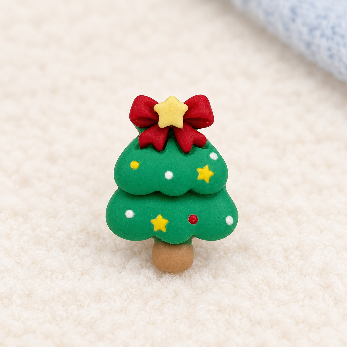Green Christmas tree dog collar charm with red bow, yellow star and colorful ornaments for festive gift styling