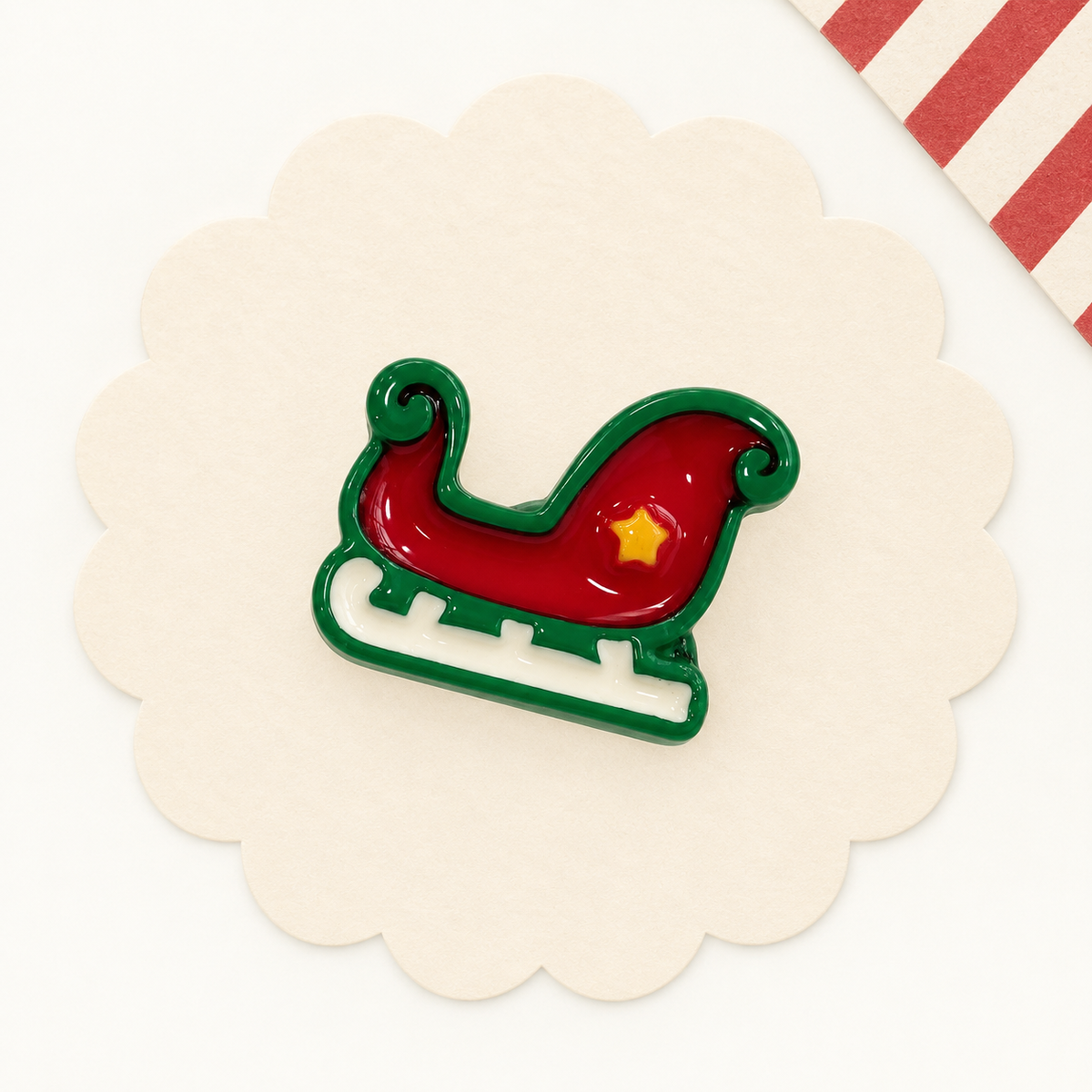 Red and green Christmas ice skate dog collar charm with a white skate blade for holiday pet styling