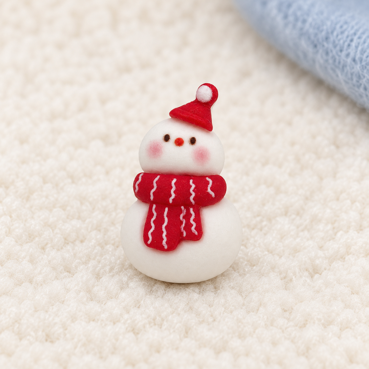 White snowman dog collar charm wearing a red Santa hat and scarf for a cheerful Christmas pet accessory