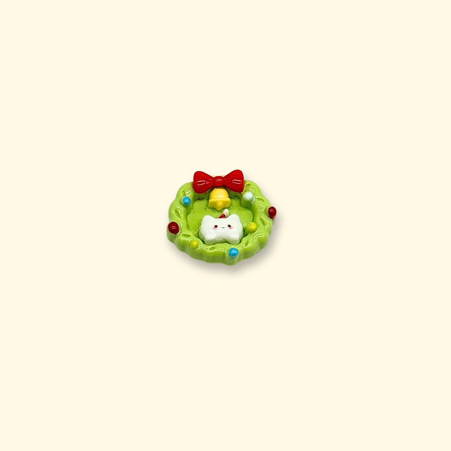 Christmas stocking charm for pets featuring candies and a festive design