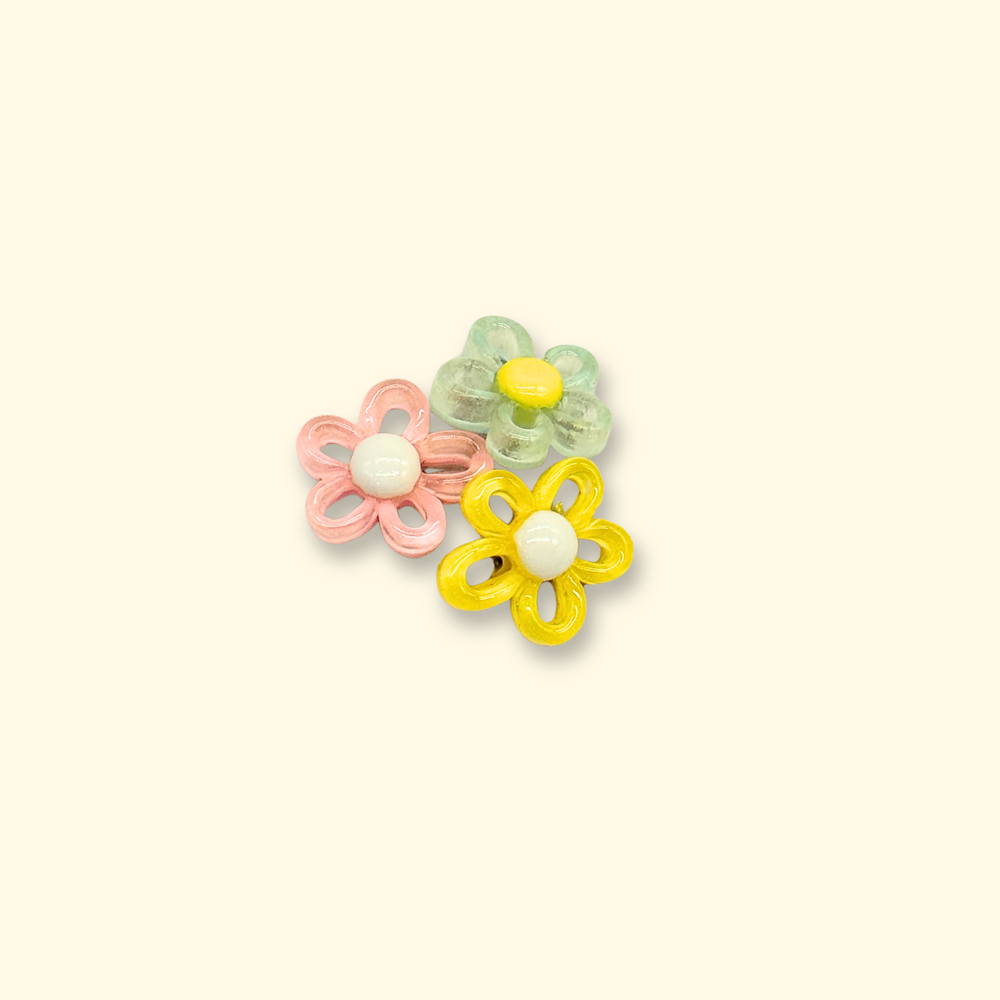 Bright multi-color flower charms for pet collars featuring yellow, pink, and green colors
