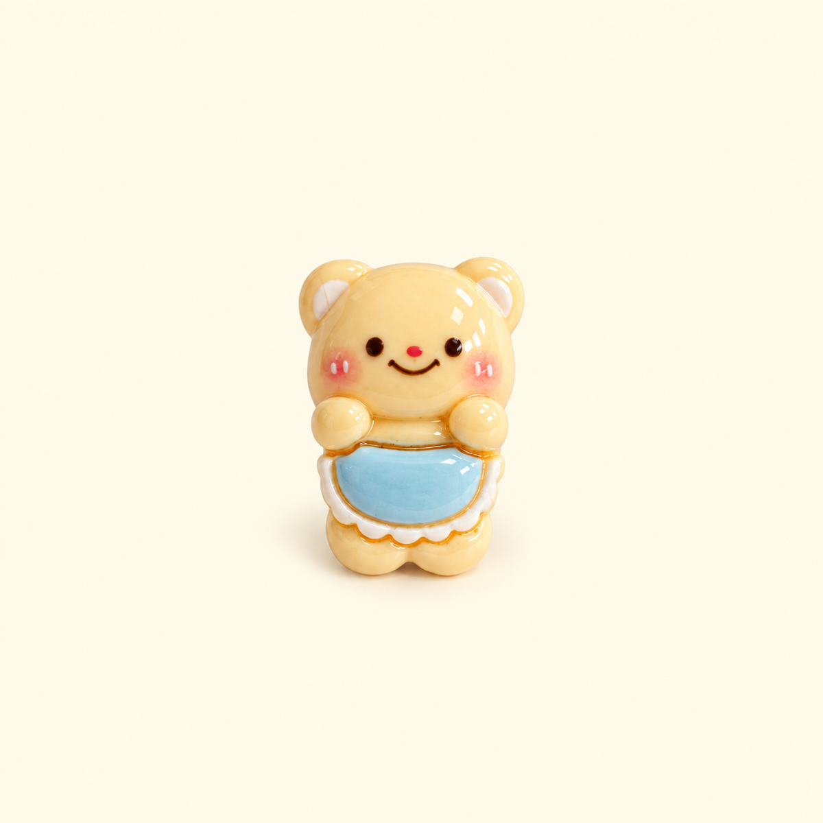 Cozy Butter Bear dog collar charm featuring a smiling bear holding a pastel blue cushion