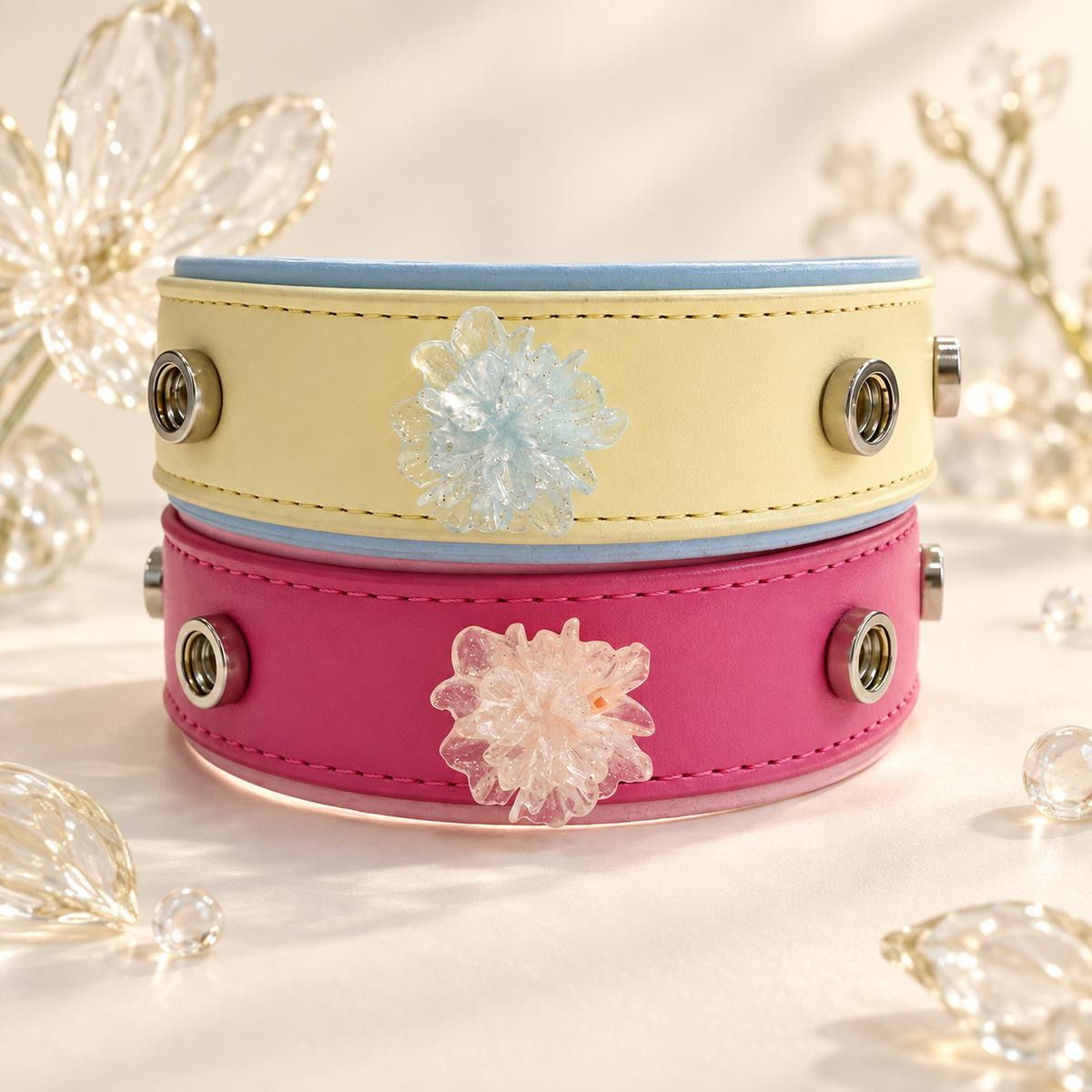 Crystal Blossom dog collar charms in ice blue and blush pink styled on yellow and pink PETIRIA collars