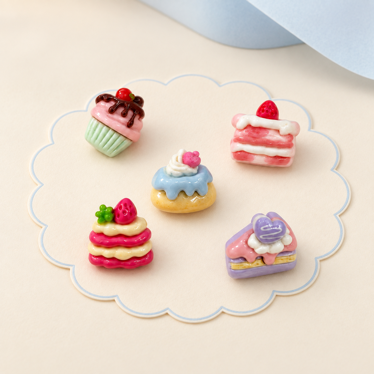 Cute cake dog collar charms featuring colorful cupcakes, strawberry cakes and pastel dessert designs