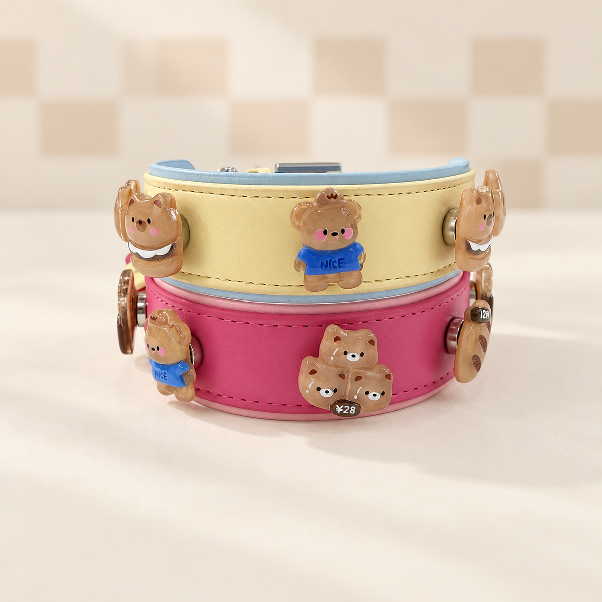 Cute character dog collar charms with playful brown cartoon designs styled on yellow and pink PETIRIA collars