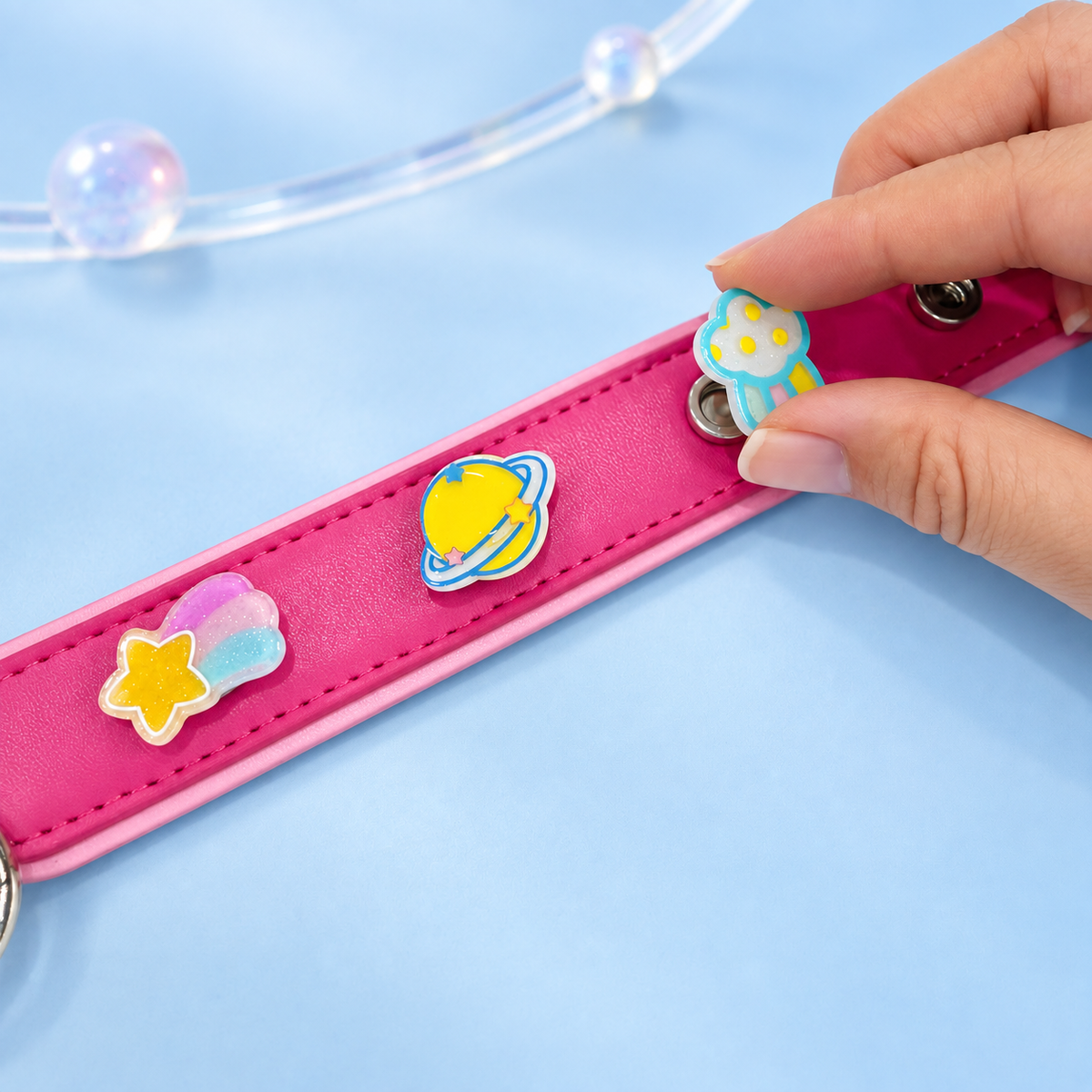 Cute space dog collar charm collection featuring Sunny Saturn, Rainbow Shooting Star, Pink UFO and Cosmic Flower designs
