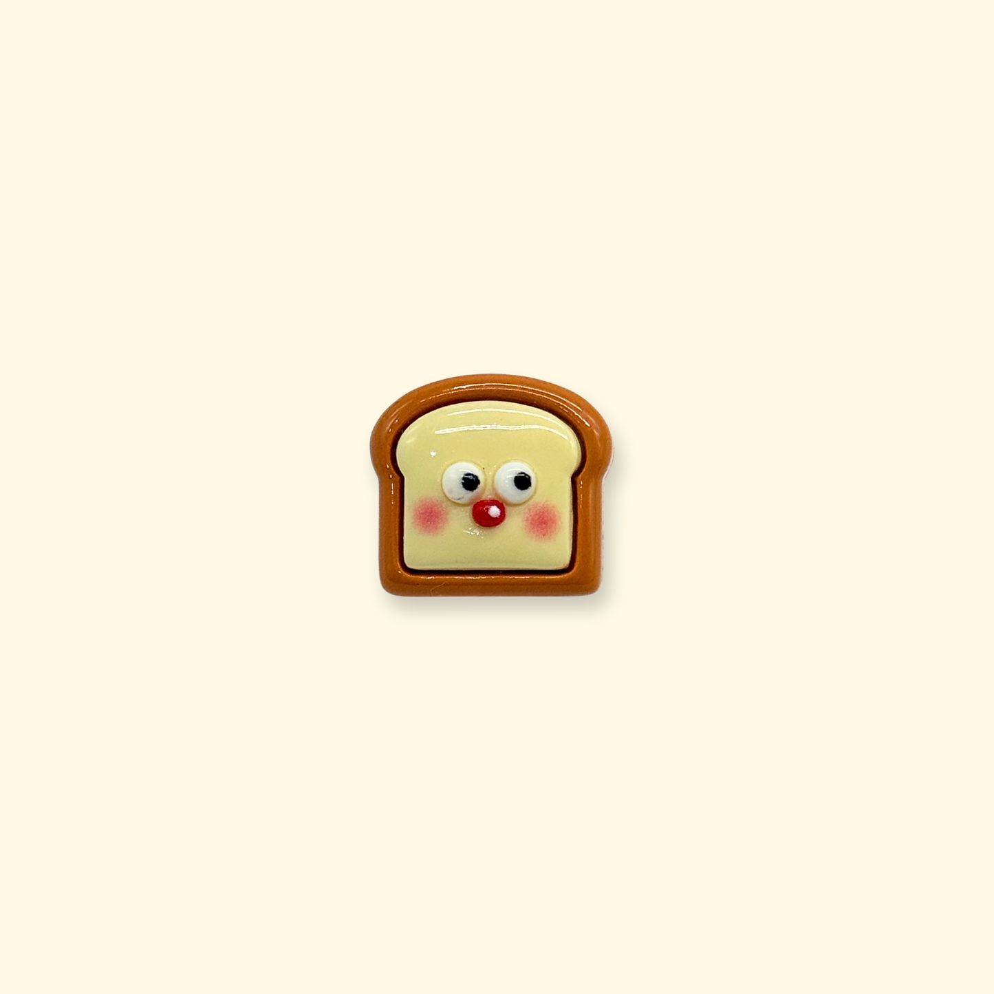 Cute toast face dog collar charm with blushing cheeks, kawaii bread-inspired snap-on accessory for interchangeable dog collar customization
