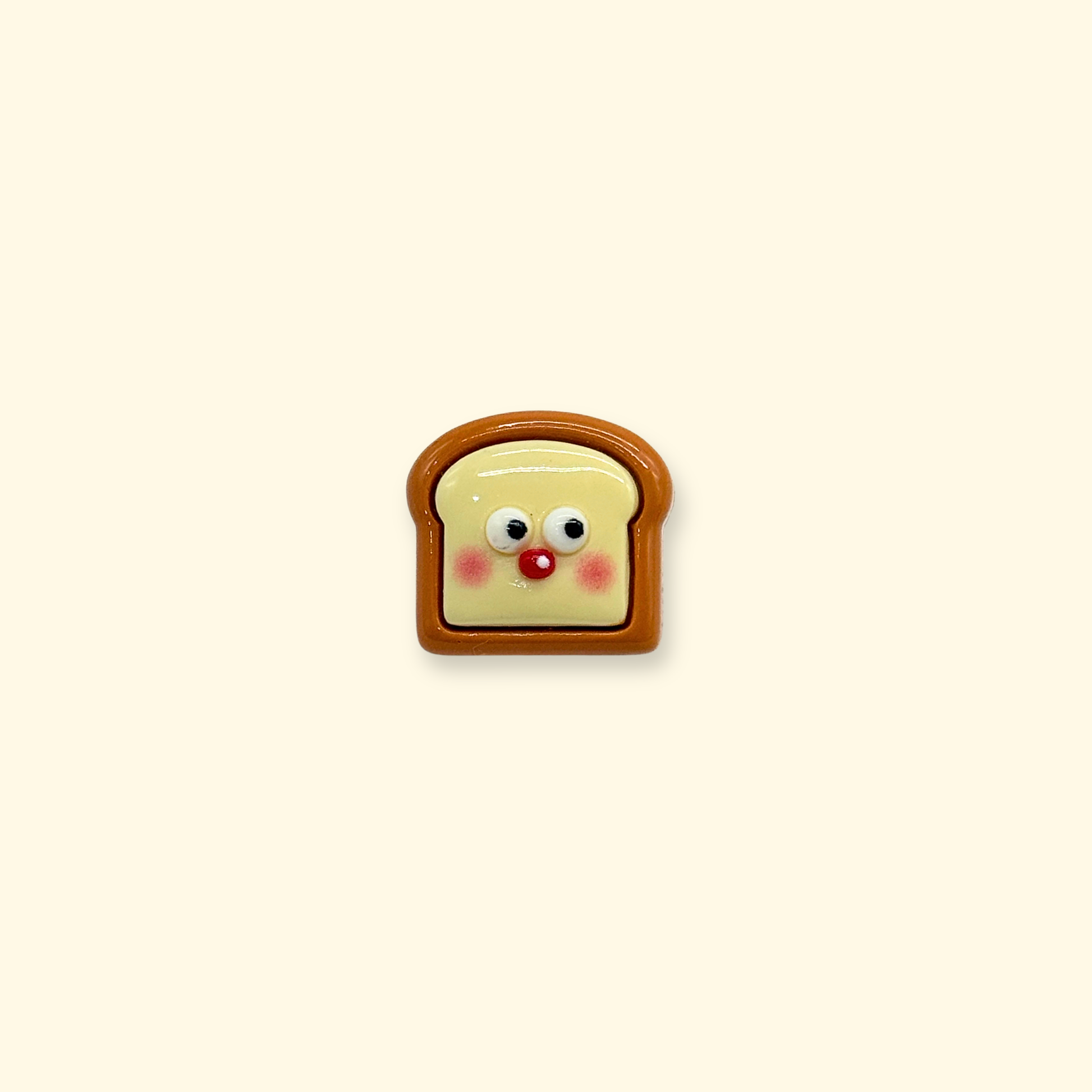 Cute toast face dog collar charm with blushing cheeks, kawaii bread-inspired snap-on accessory for interchangeable dog collar customization