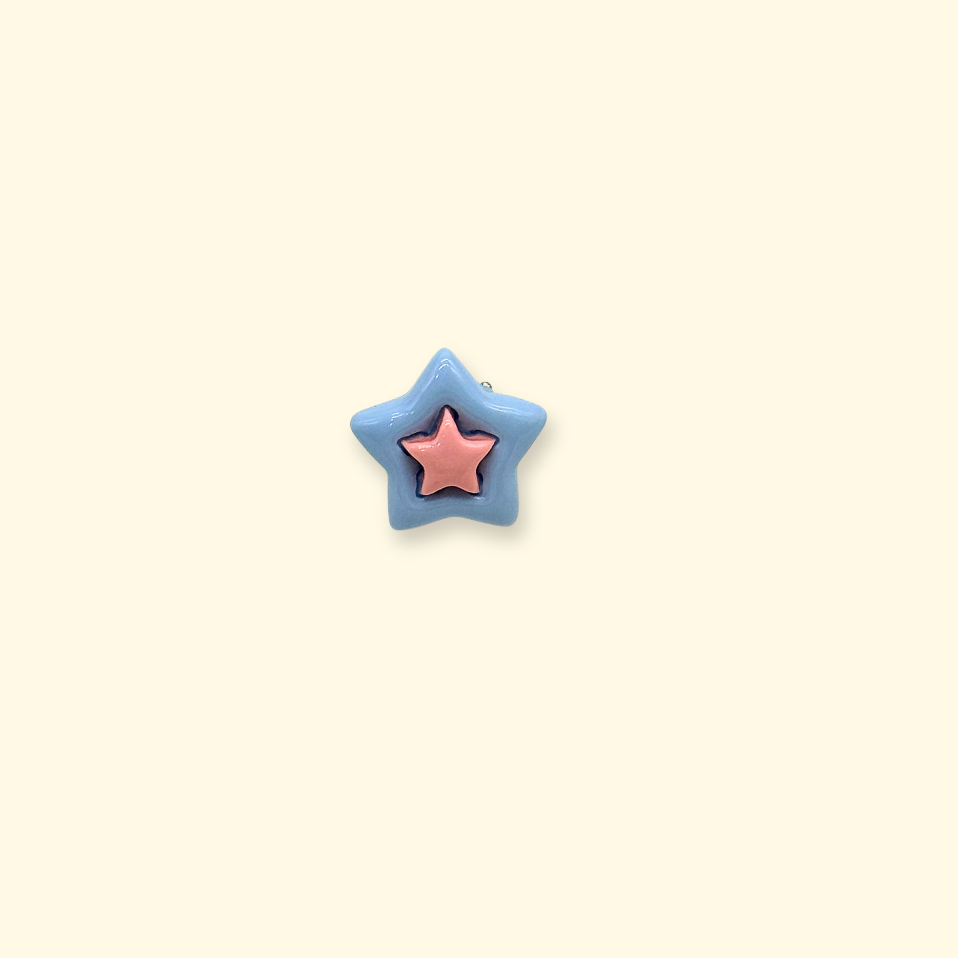 Blue star shaped dog collar charm with pink star center, lightweight snap-on pet accessory for interchangeable collars