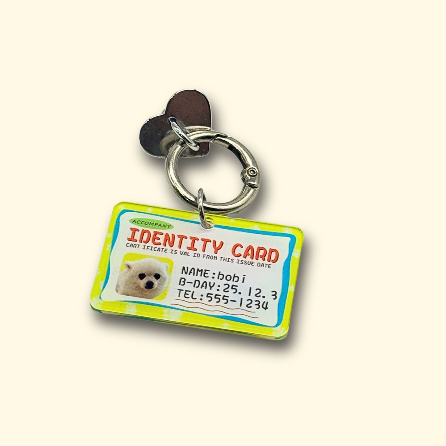 Personalized dog ID tag attached with a DIY dog collar charm connector for customizable pet collar accessories