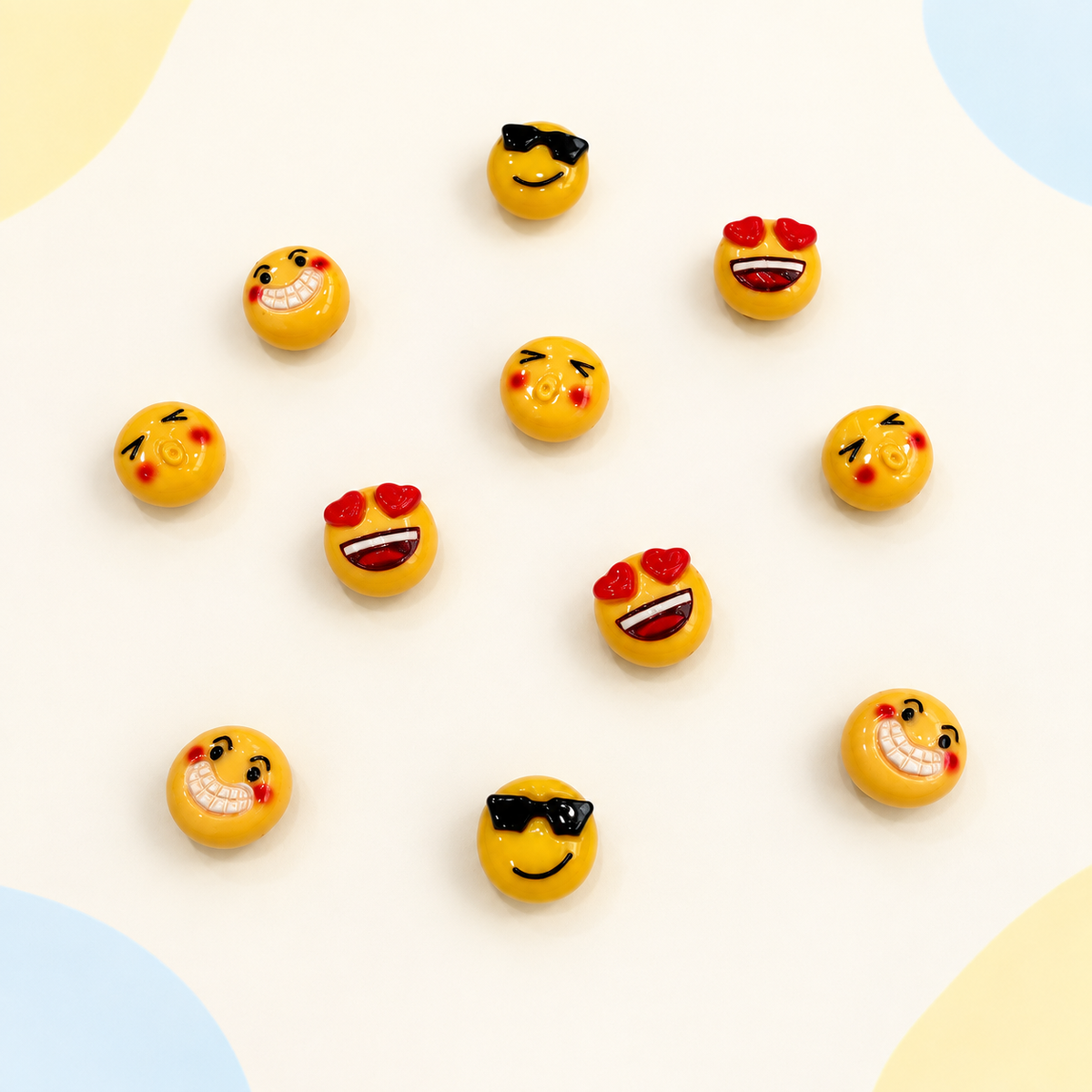 Funny emoji dog collar charms featuring heart eyes, sunglasses, kiss face and laughing expressions