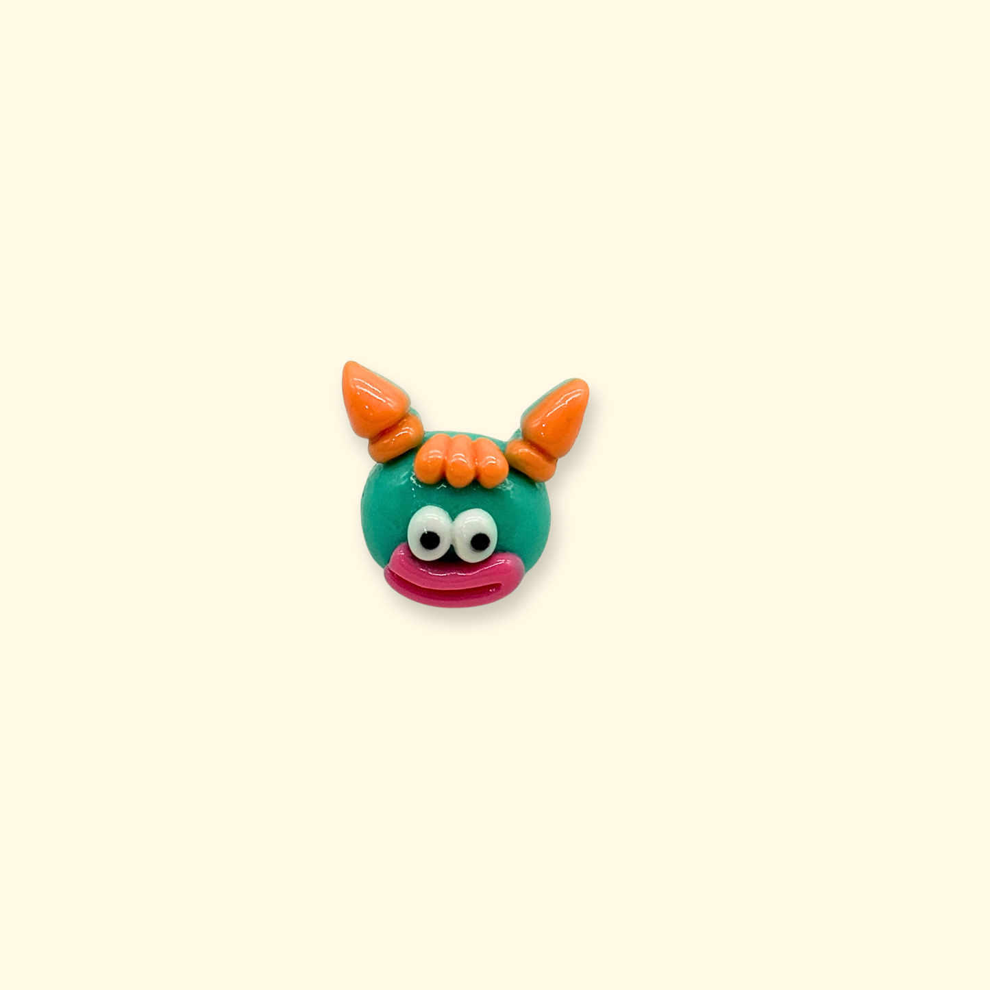 Teal horned emoji dog collar charm with playful monster expression designed for unique pet styling