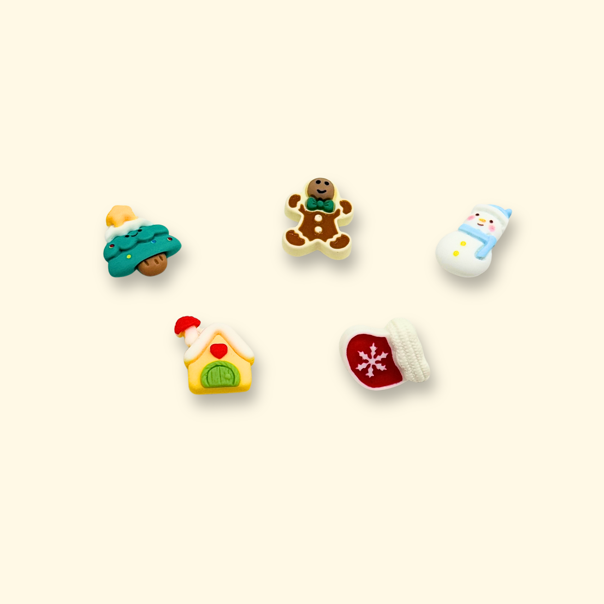 Christmas-themed pet collar with gingerbread man, snowman, and Christmas tree charms. Holiday collars for dogs and cats.