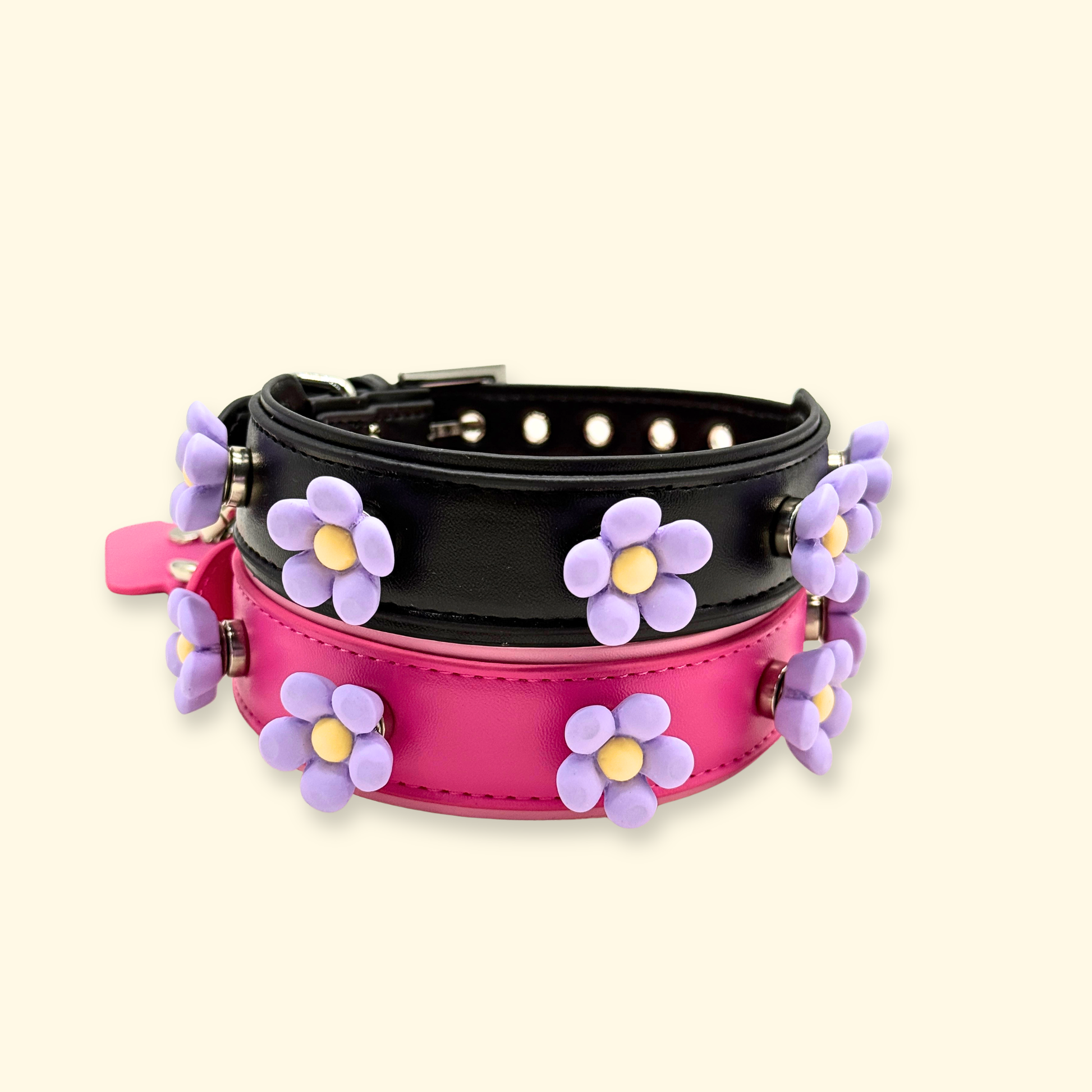 Black and pink dog collars with purple daisy snap-on charms, interchangeable pet collar system for mix and match styling