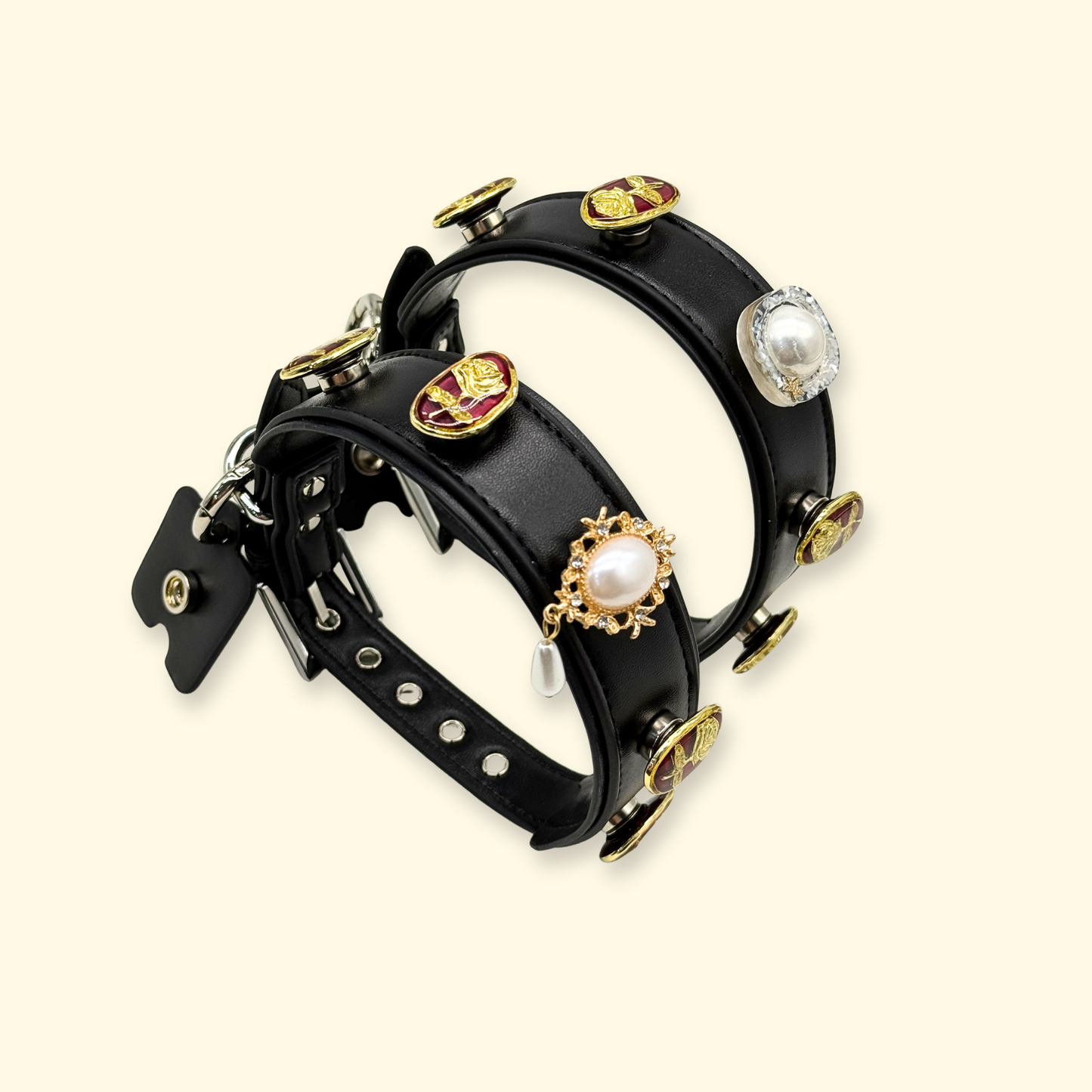 Multiple views of a black adjustable dog collar decorated with vintage pearl and rose enamel charms, demonstrating mix-and-match styling options for customizable pet collars.