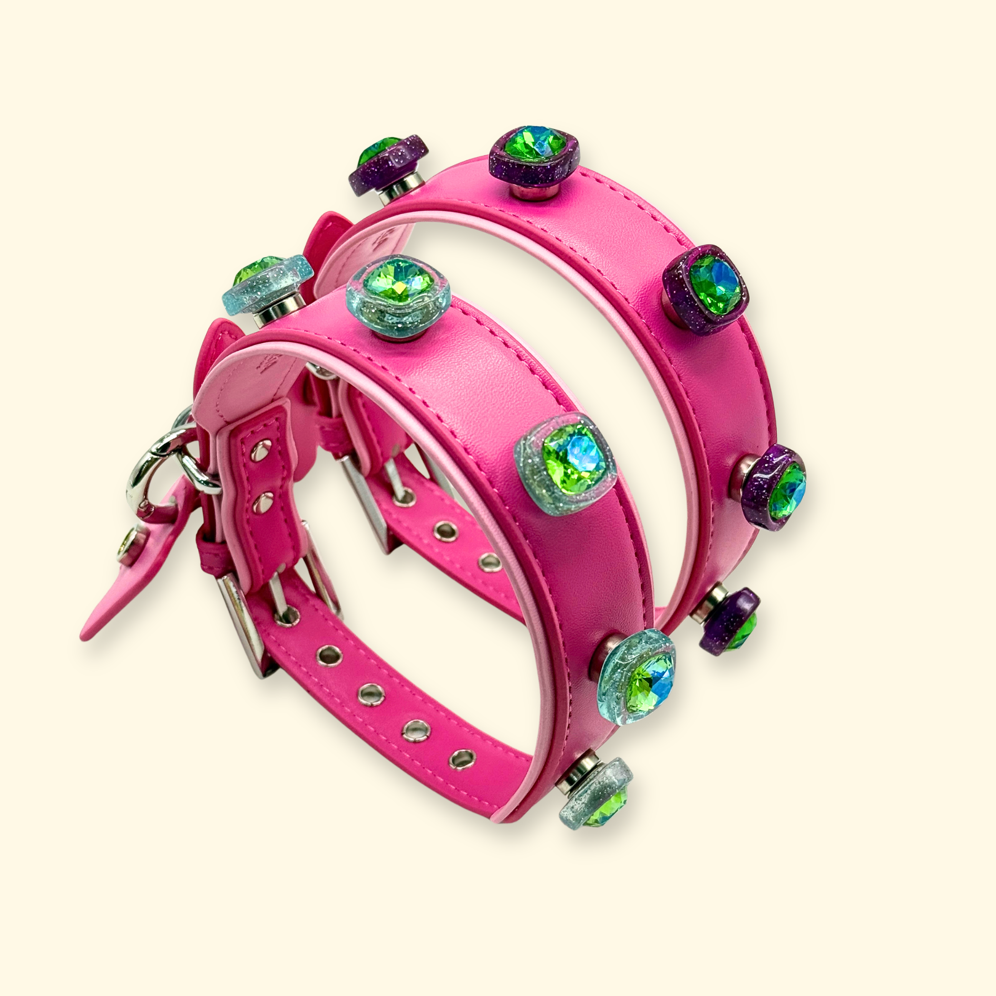 Interchangeable luxury dog collars with crystal snap-on charms displayed in angled product shot for pet styling