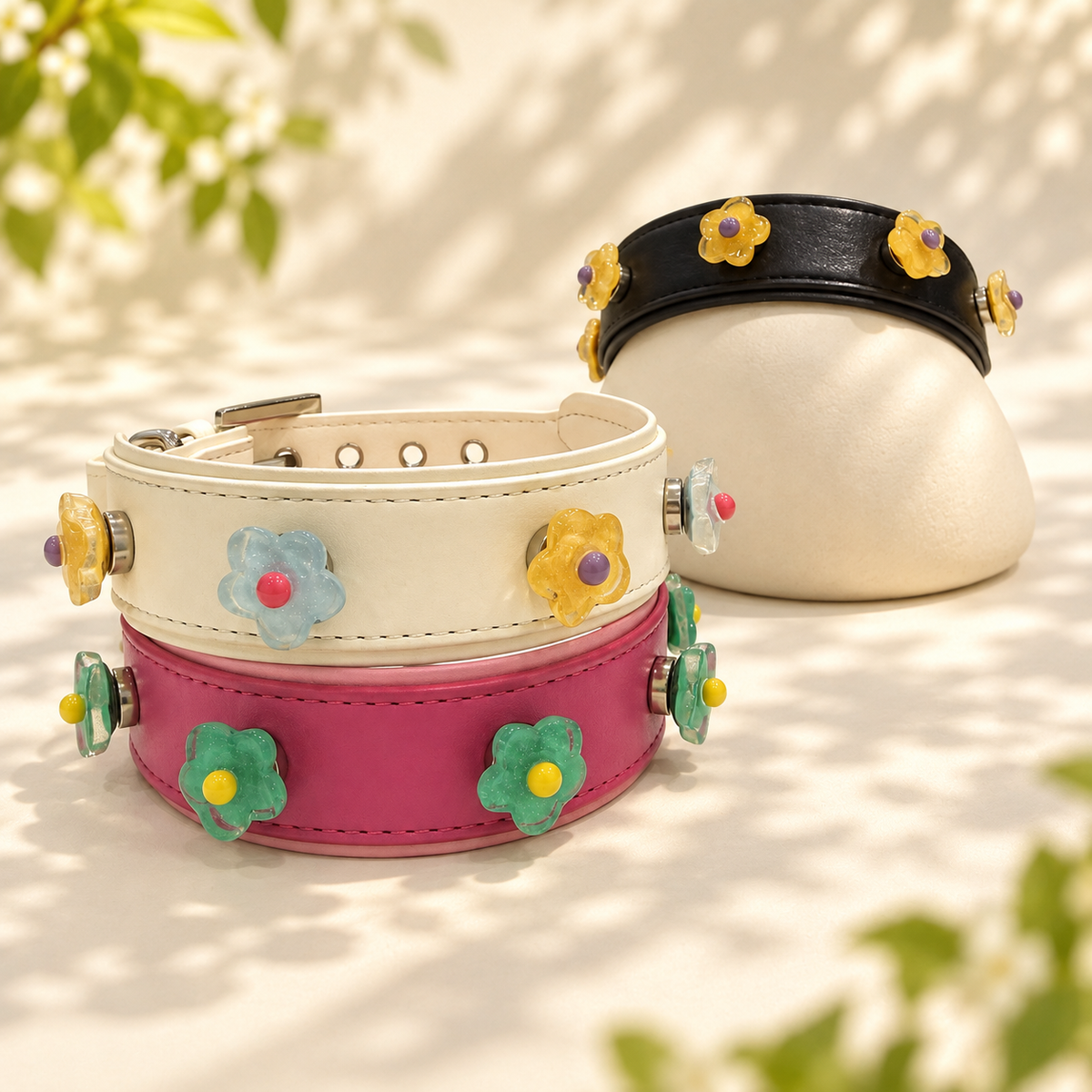 Pastel mini flower dog collar charms in blue, yellow and green styled on PETIRIA collars