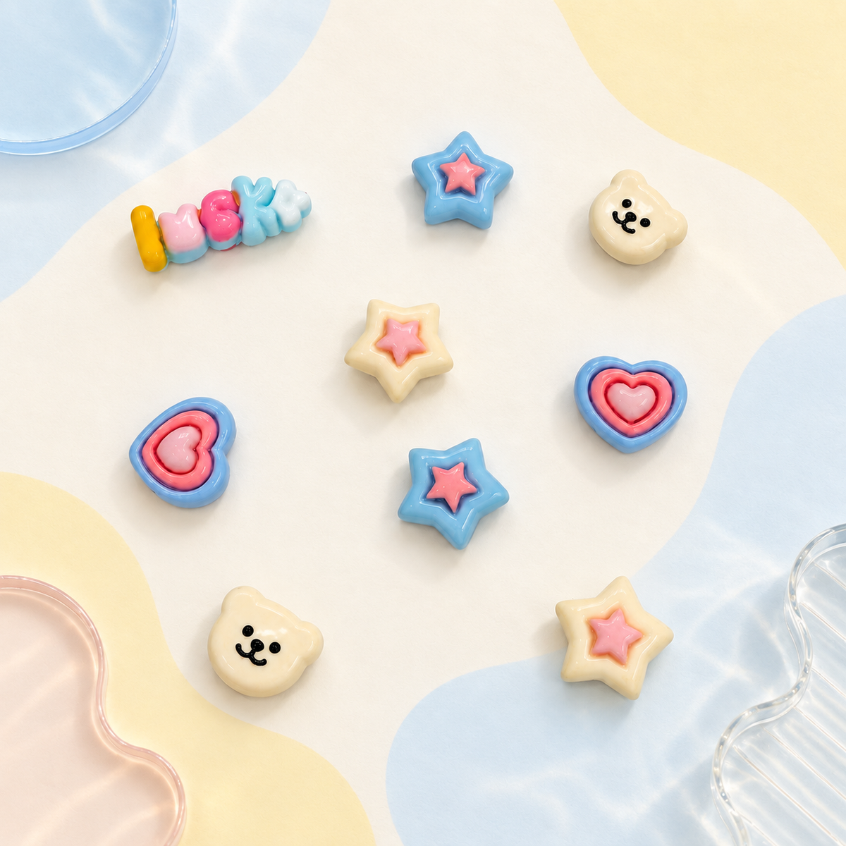 Pastel dog collar charms featuring stars, hearts, LOVE lettering and cute character designs