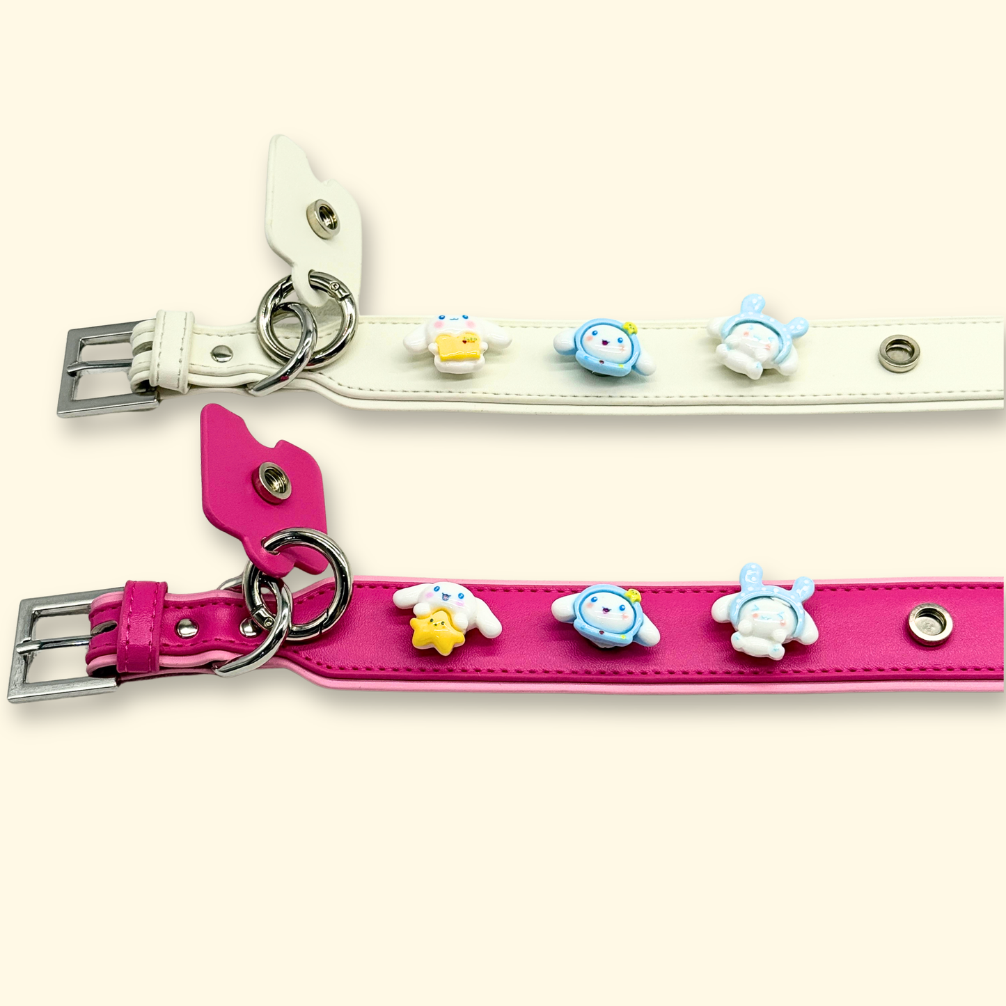 Two pet collars featuring adorable bunny charm accessories in pastel colors – pink and white straps