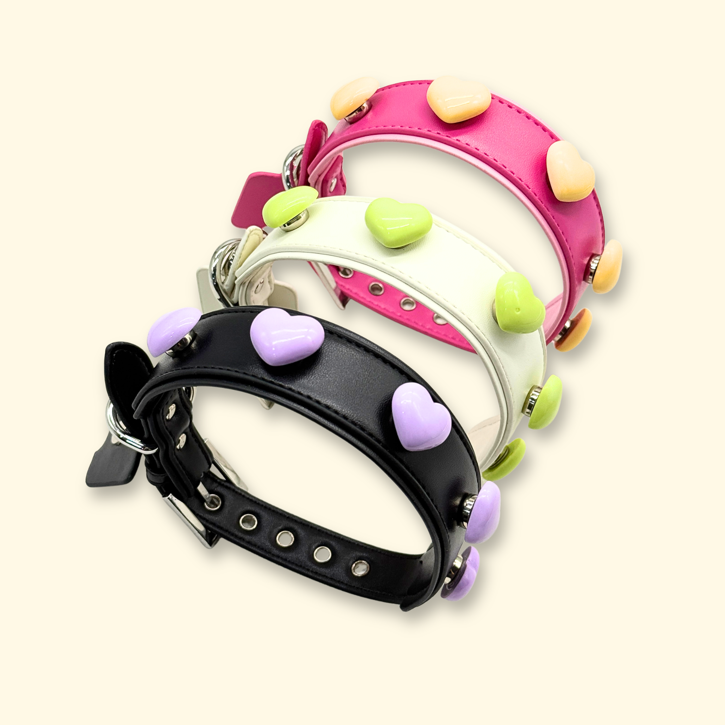 Luxury dog collars with removable pastel heart charms in lavender, lime green, and butter yellow for stylish pets and customizable looks