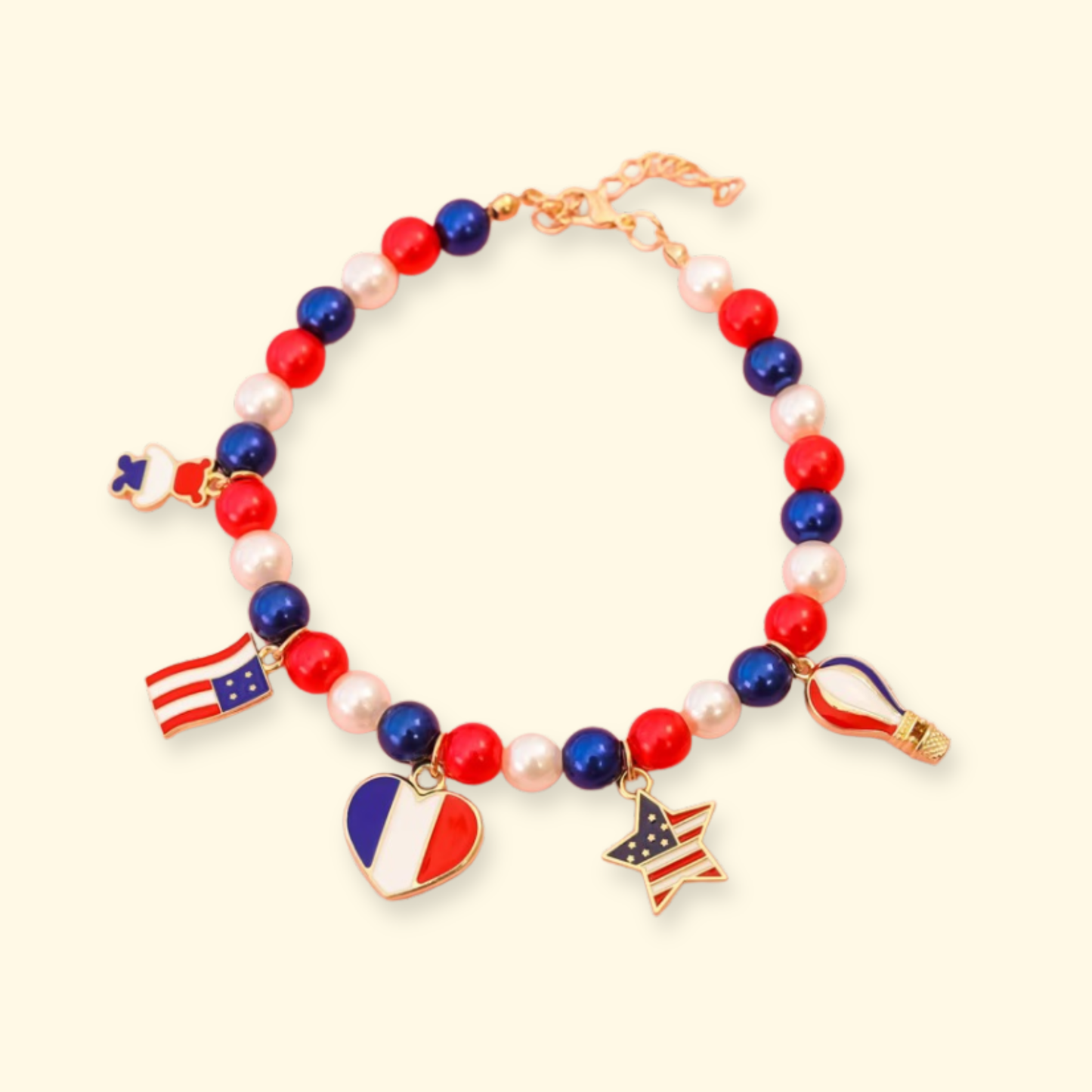 Red white and blue patriotic dog necklace with American flag bow charm, heart charm and bell for 4th of July dog outfits