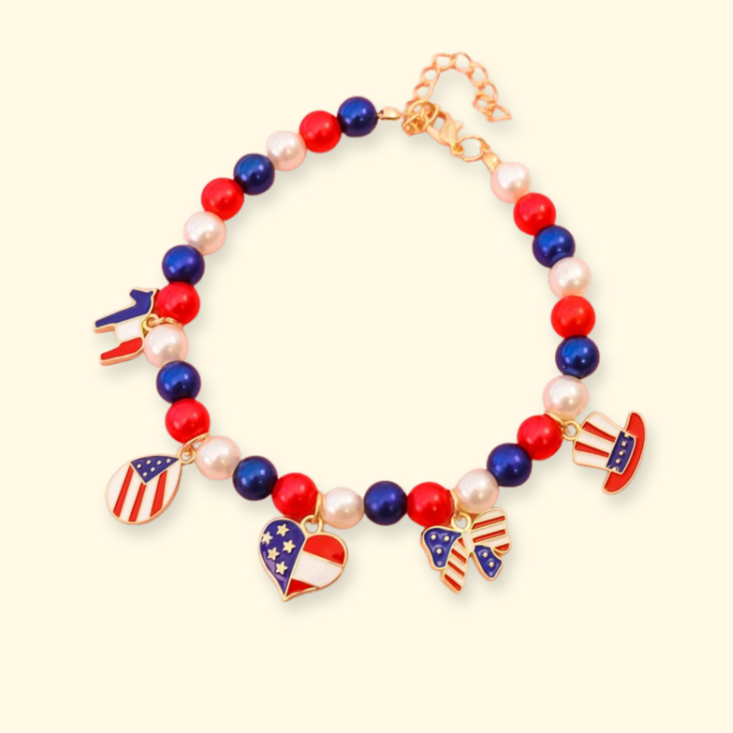 Patriotic dog necklace with American flag shield charm, heart charm and striped bow charm for 4th of July pet outfits