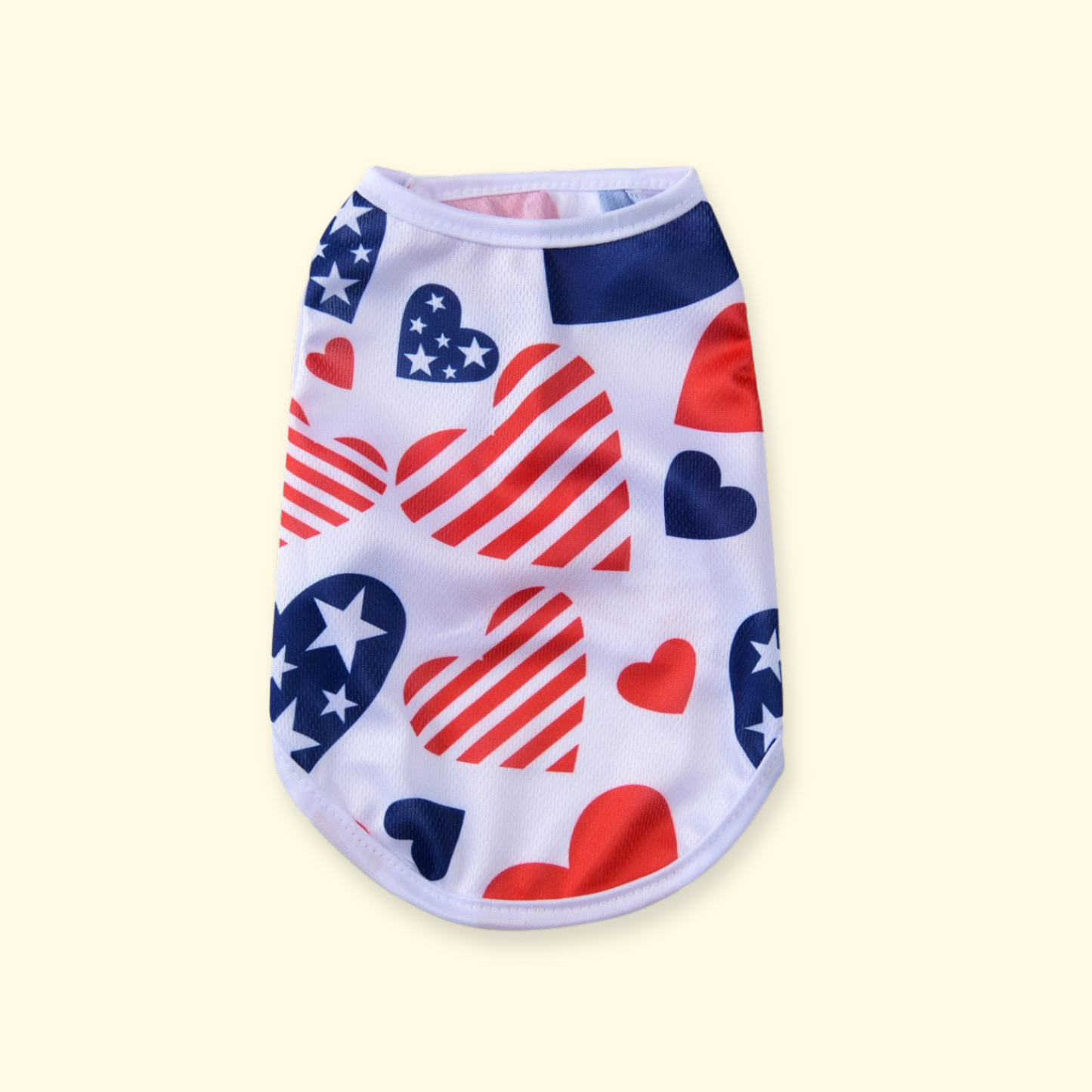 Summer dog tank top with patriotic heart print design, lightweight breathable fabric for everyday wear and holiday celebrations.