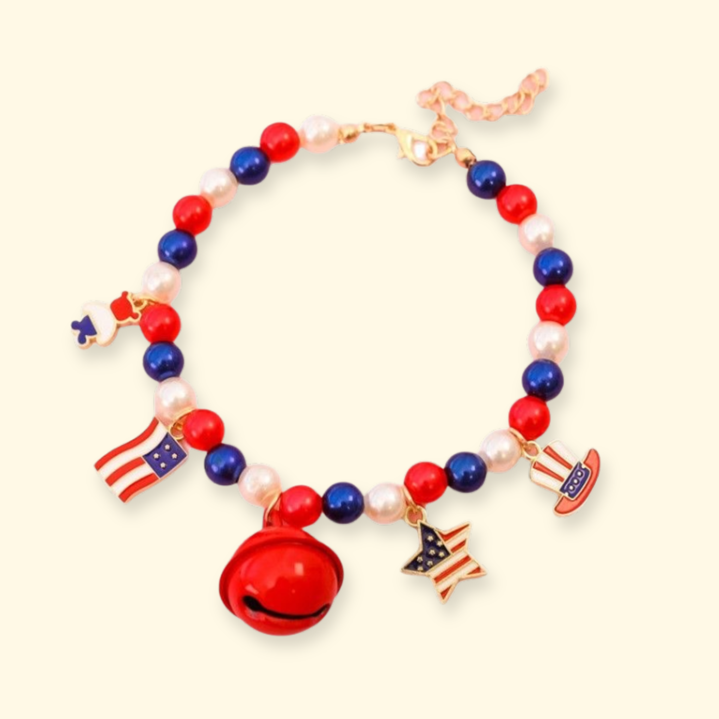 Patriotic dog necklace featuring American flag charm, star charm, cowboy hat charm and red bell for Independence Day celebrations