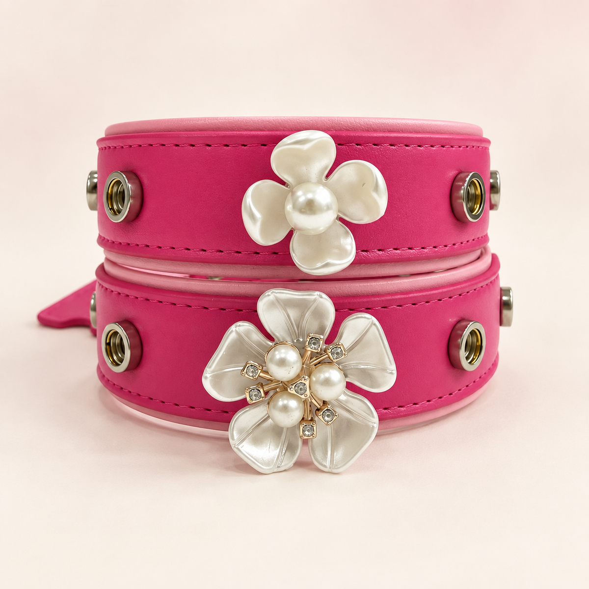 Pink PETIRIA collars styled with pearl flower dog collar charms featuring luminous floral designs