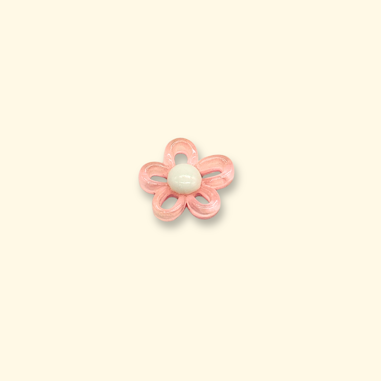 Pink flower-shaped charm for pet collars, perfect for adding a soft and feminine touch to your pet's accessories