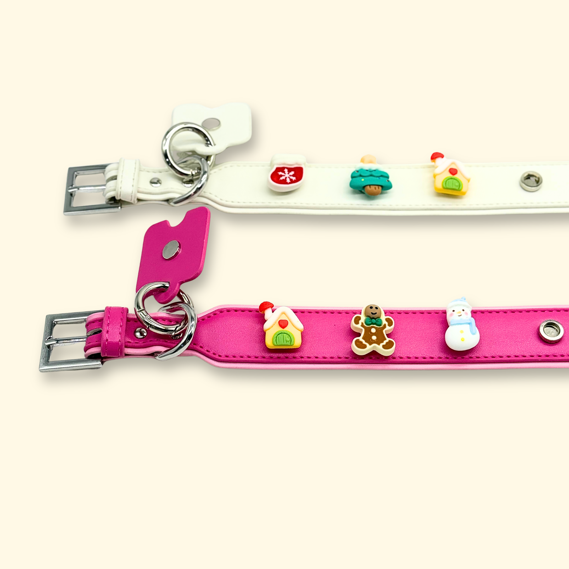 Pink and white dog collar with adorable Christmas-themed charms, featuring a snowman, gingerbread man, and house charm.
