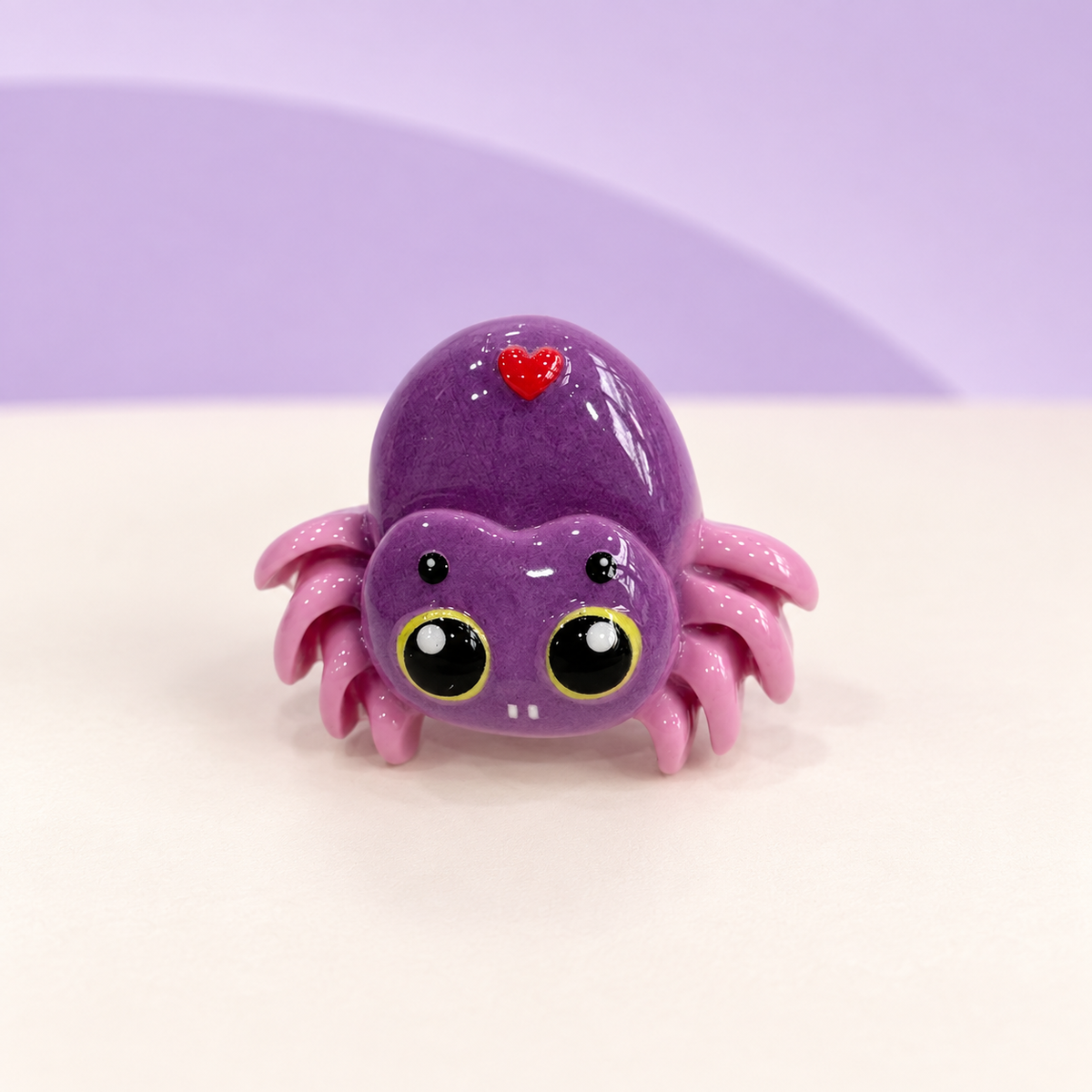 Purple spider dog collar charm with big eyes and a red heart detail for Halloween