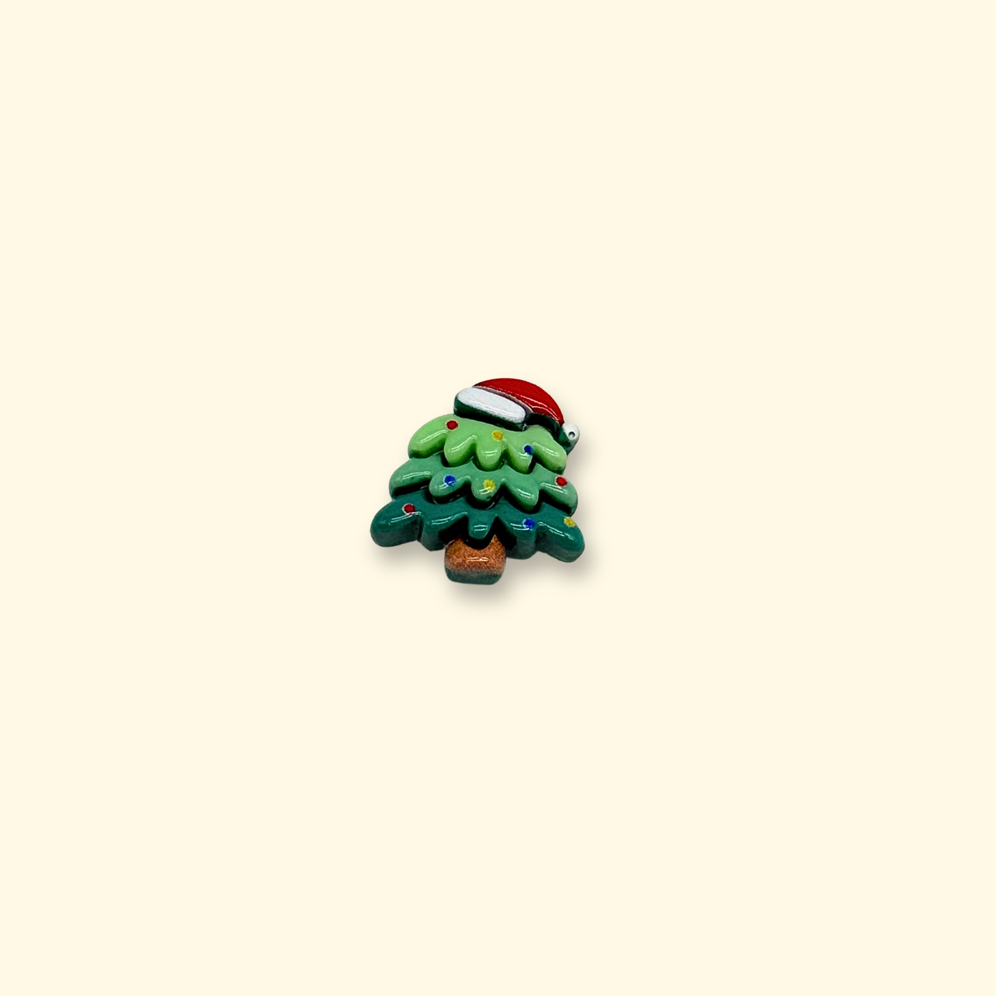Fun Santa tree pet collar charm with a small Santa hat and colorful decorations for Christmas.