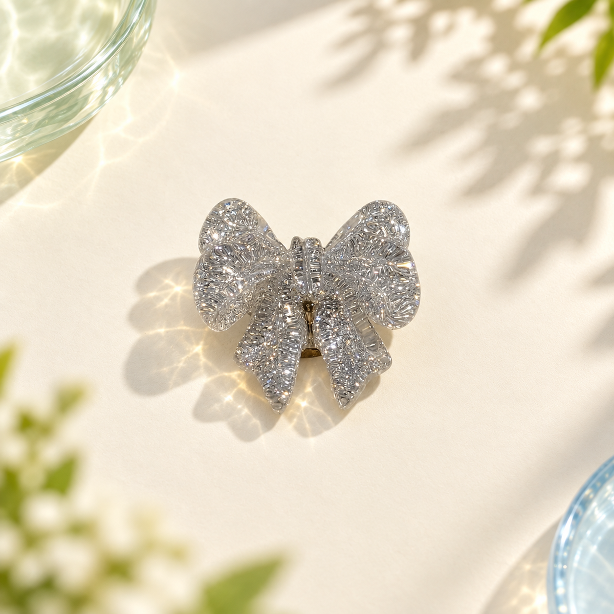 Silver bow dog collar charm with a sparkling textured finish