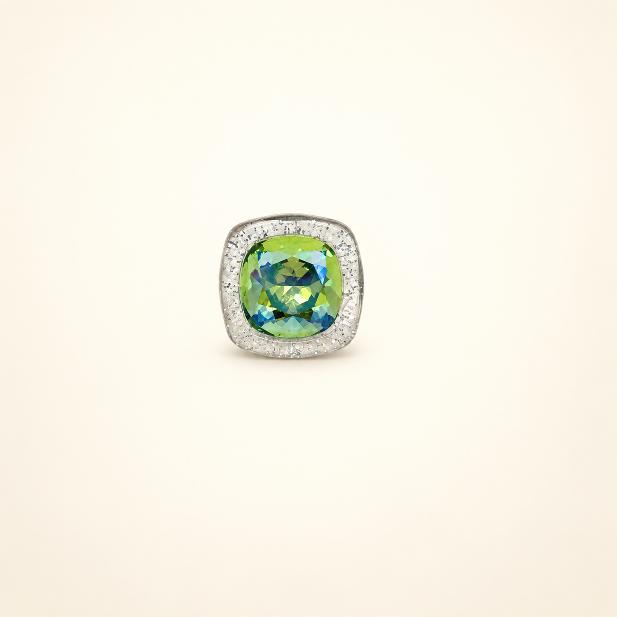 Silver-frame dog collar charm with a faceted green gem center and sparkling crystal-inspired finish