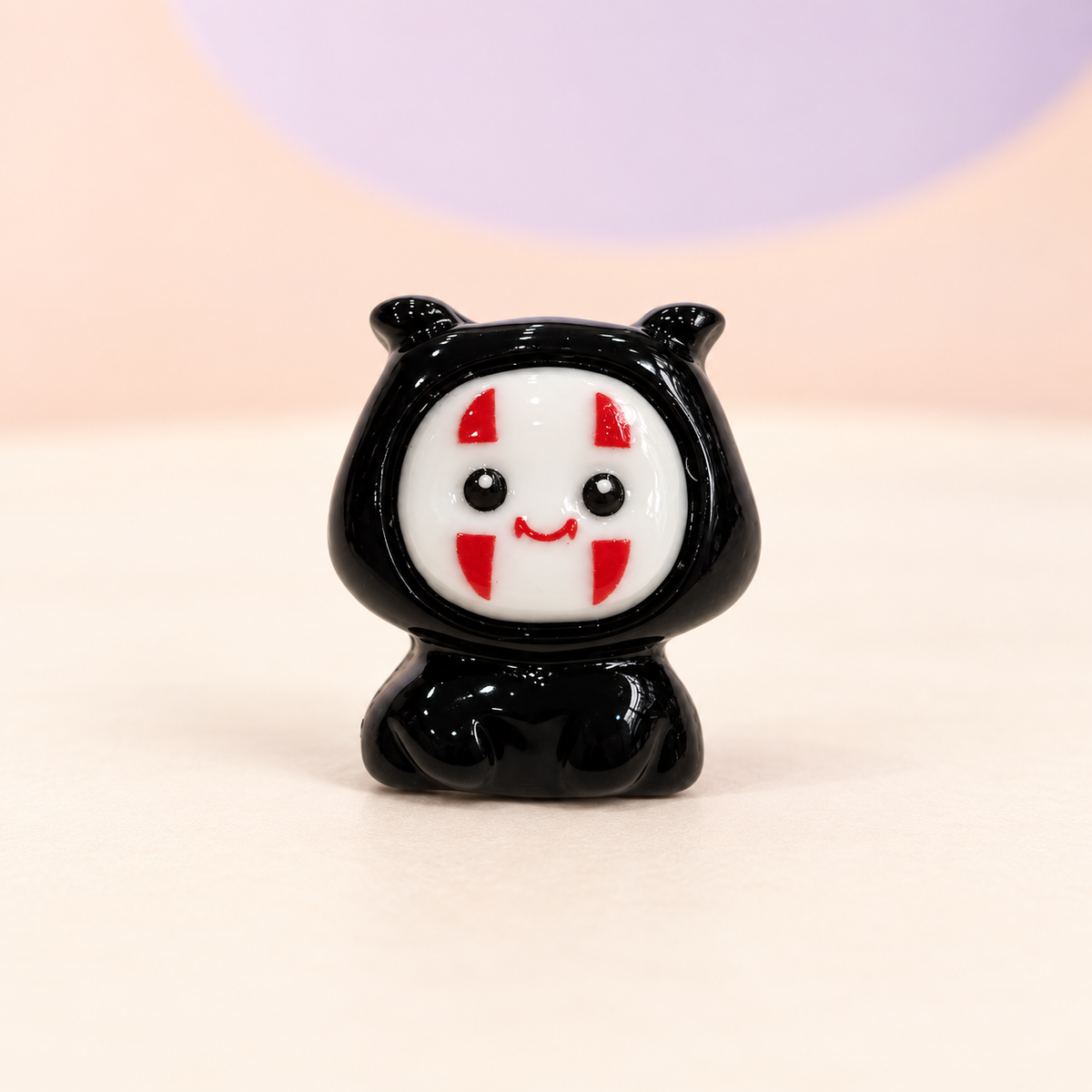 Black ghost-style Halloween dog collar charm with a white face and red details for Petiria collars