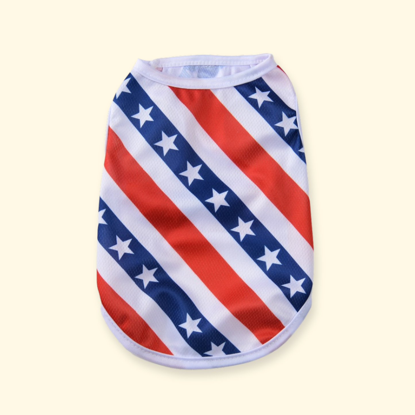 Lightweight dog tank top featuring a stars and stripes patriotic print, breathable fabric for summer walks and outdoor activities.