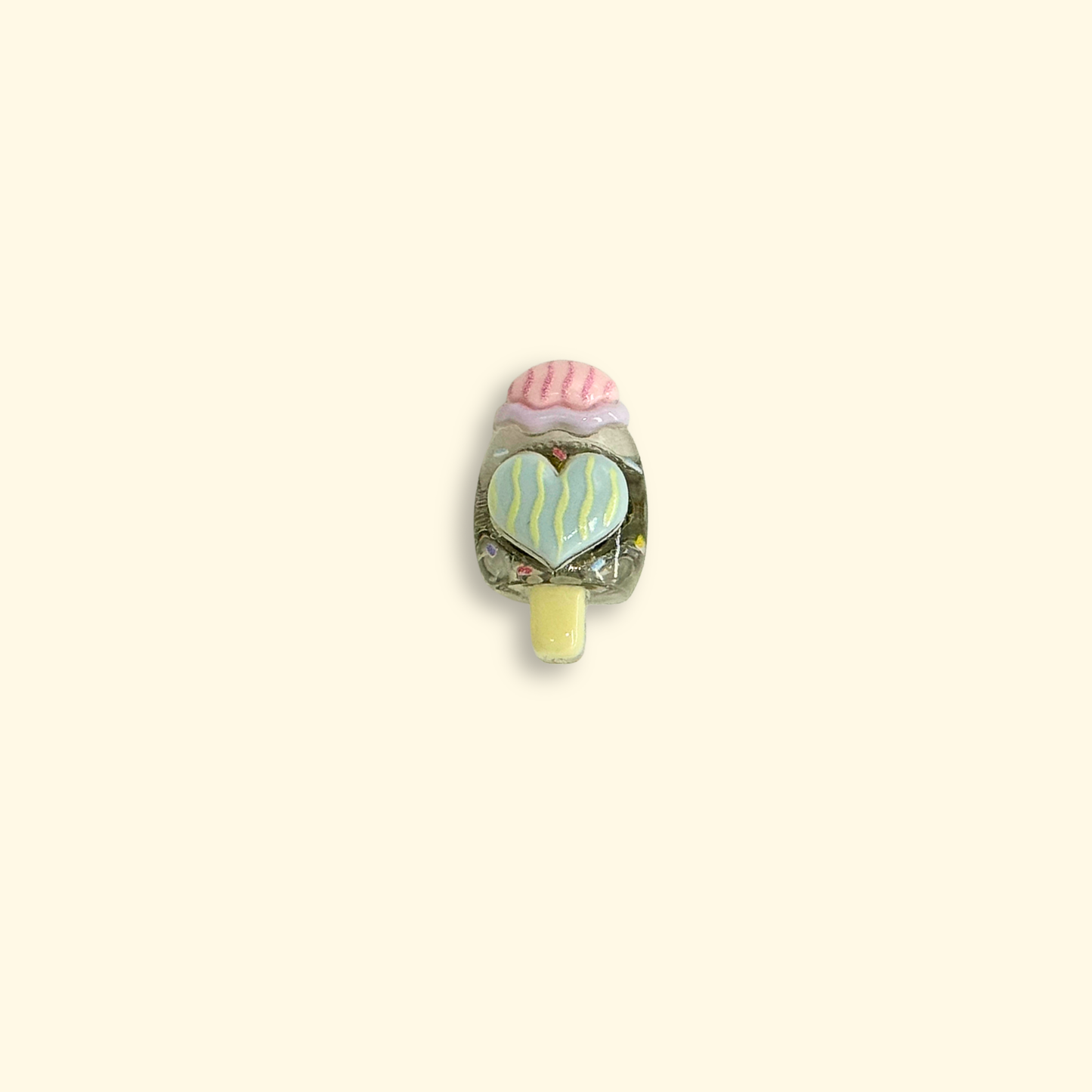 Cute ice cream popsicle charm with pink and yellow heart design, perfect for pet collars