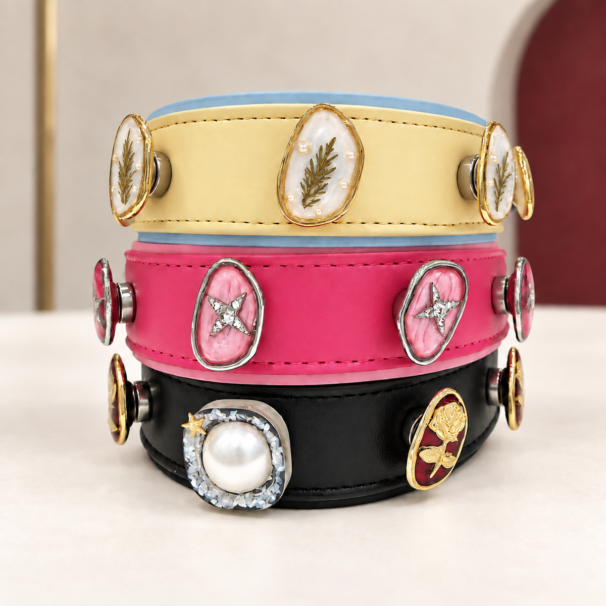 Vintage botanical dog collar charms styled on yellow, pink and black PETIRIA collars