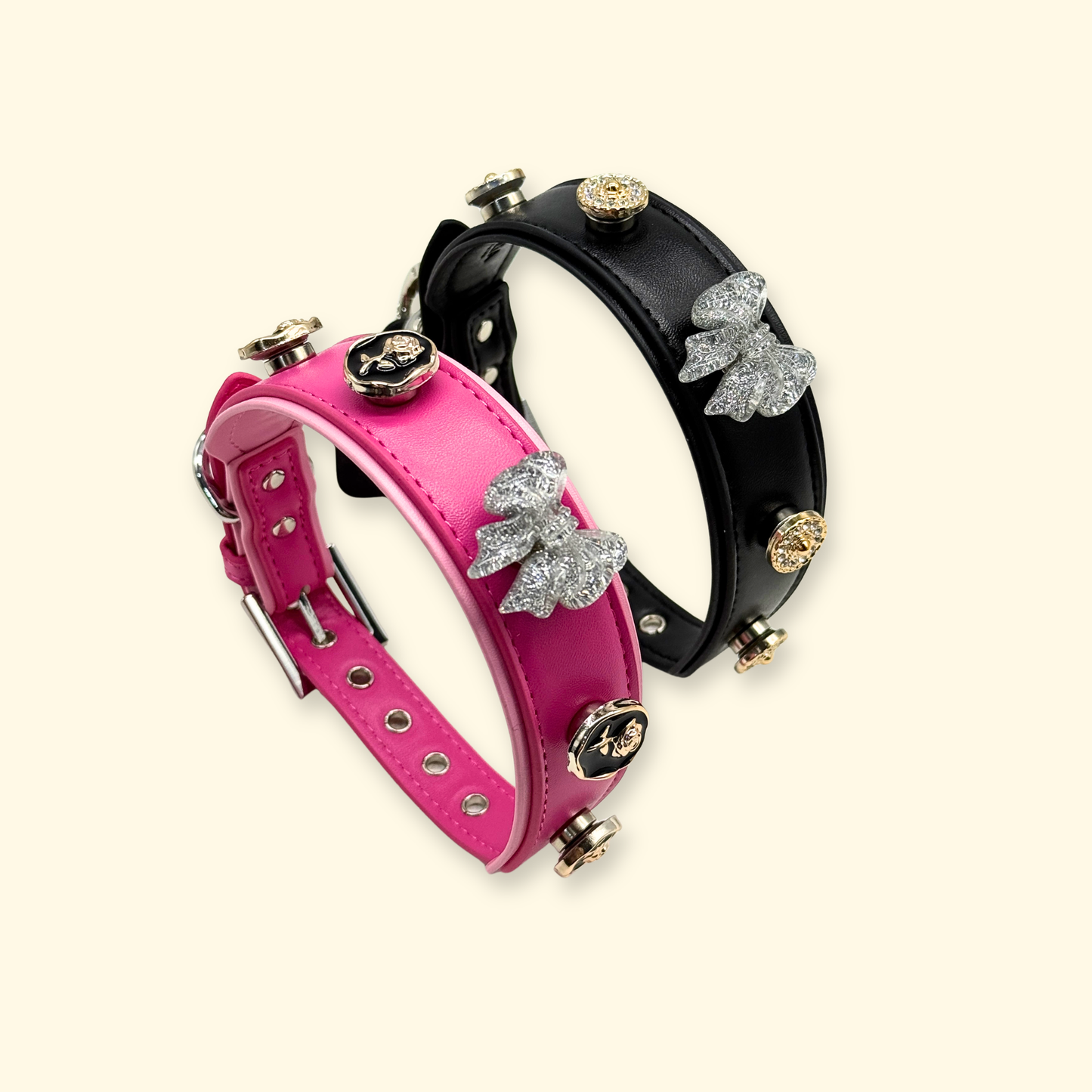 Black and pink Petiria interchangeable dog collars styled with vintage bow, rose, and rhinestone snap-on collar charms.